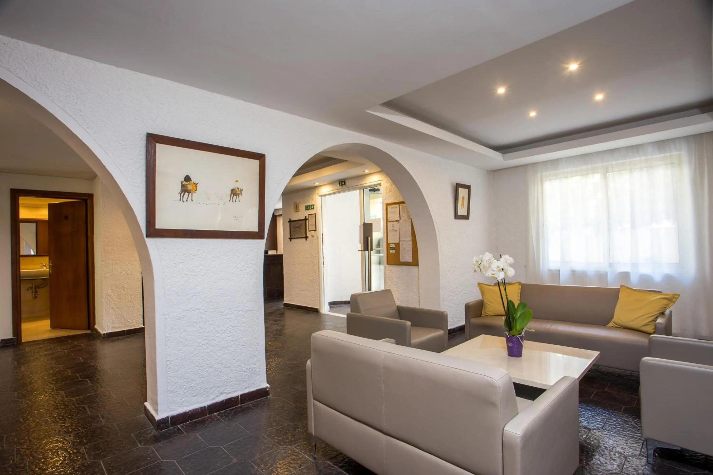 Communal lounge/ TV room in Royal Aparthotel City Centre