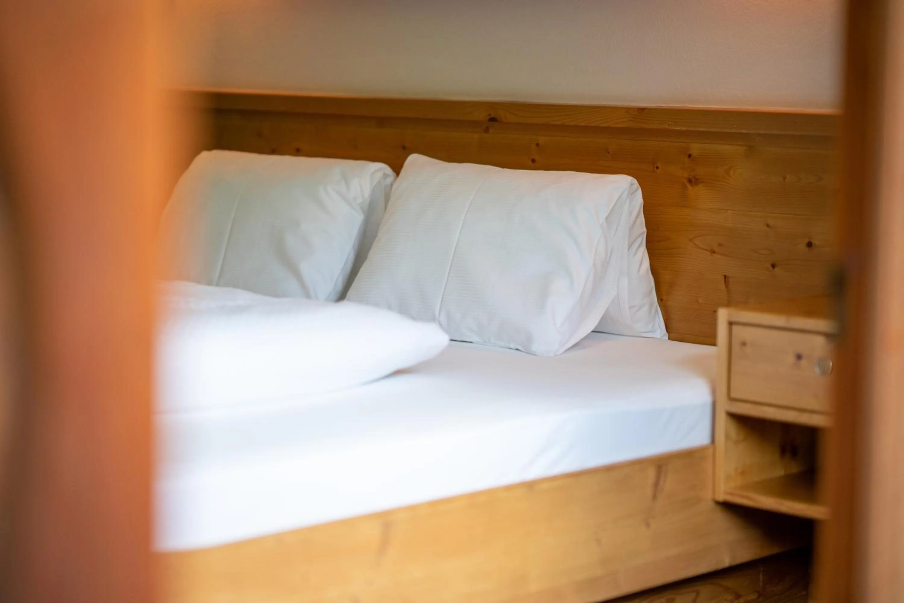 Bed in Ferienpension Senfter