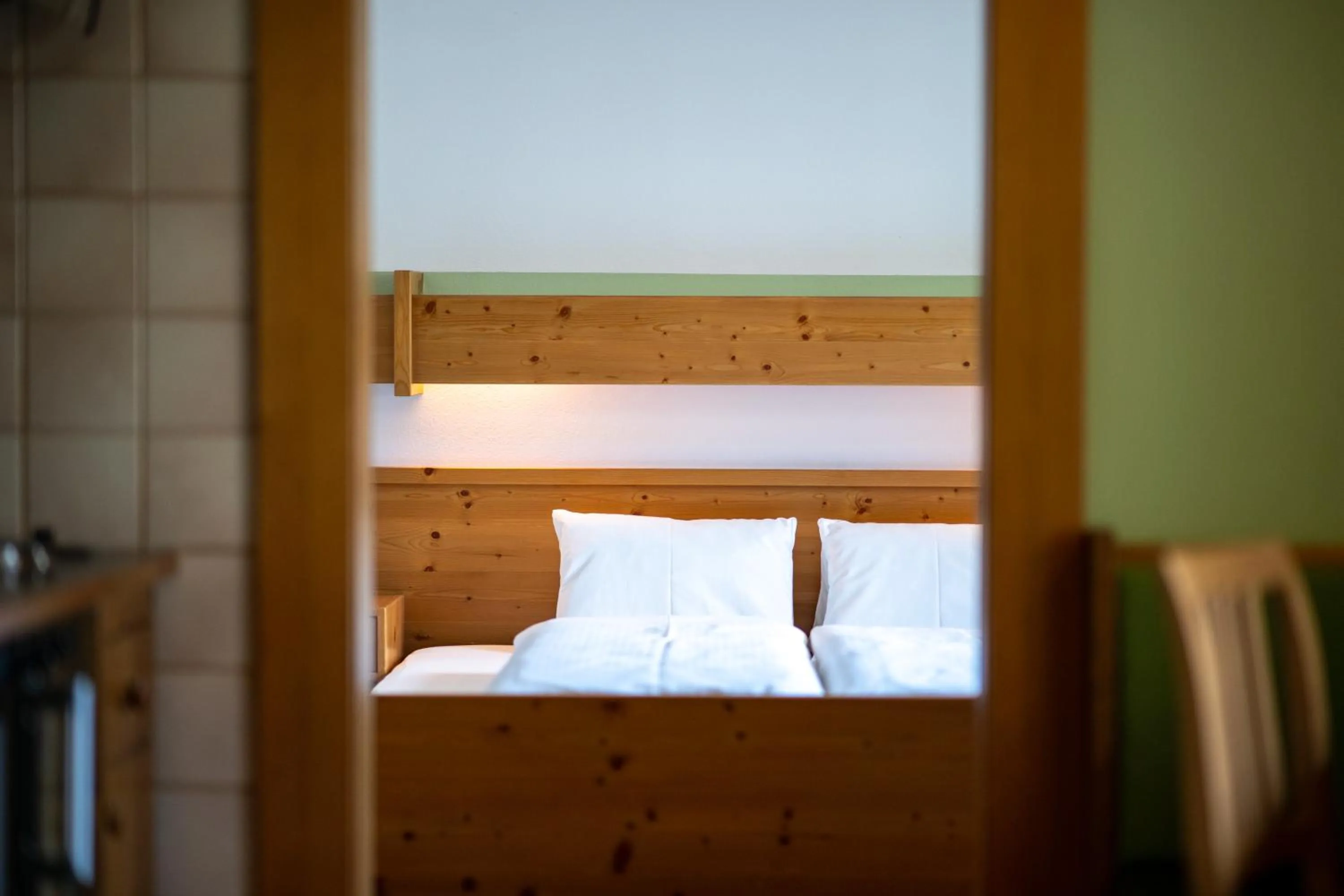 Bed in Ferienpension Senfter