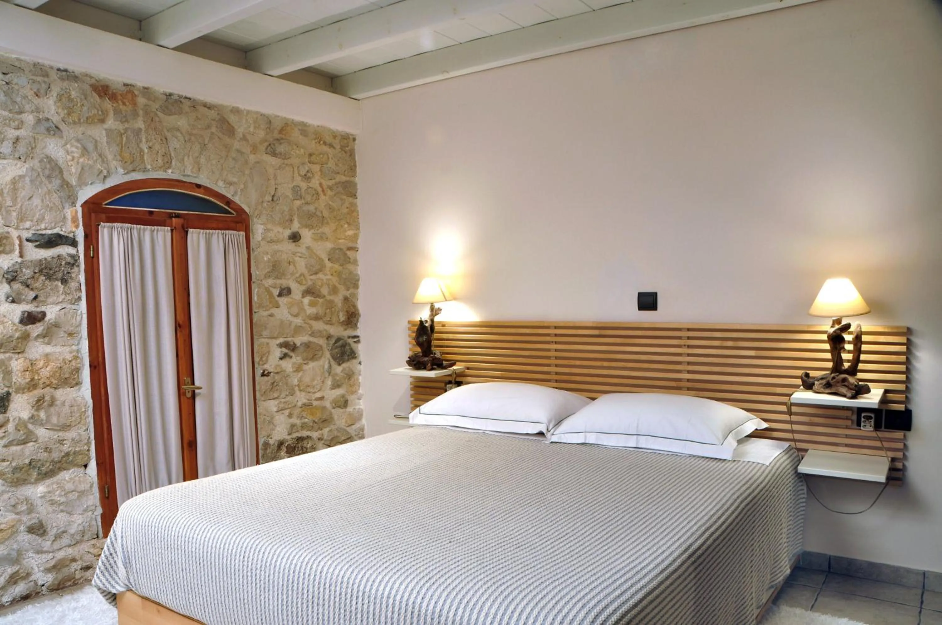 Bed in Limni Stone Apartments