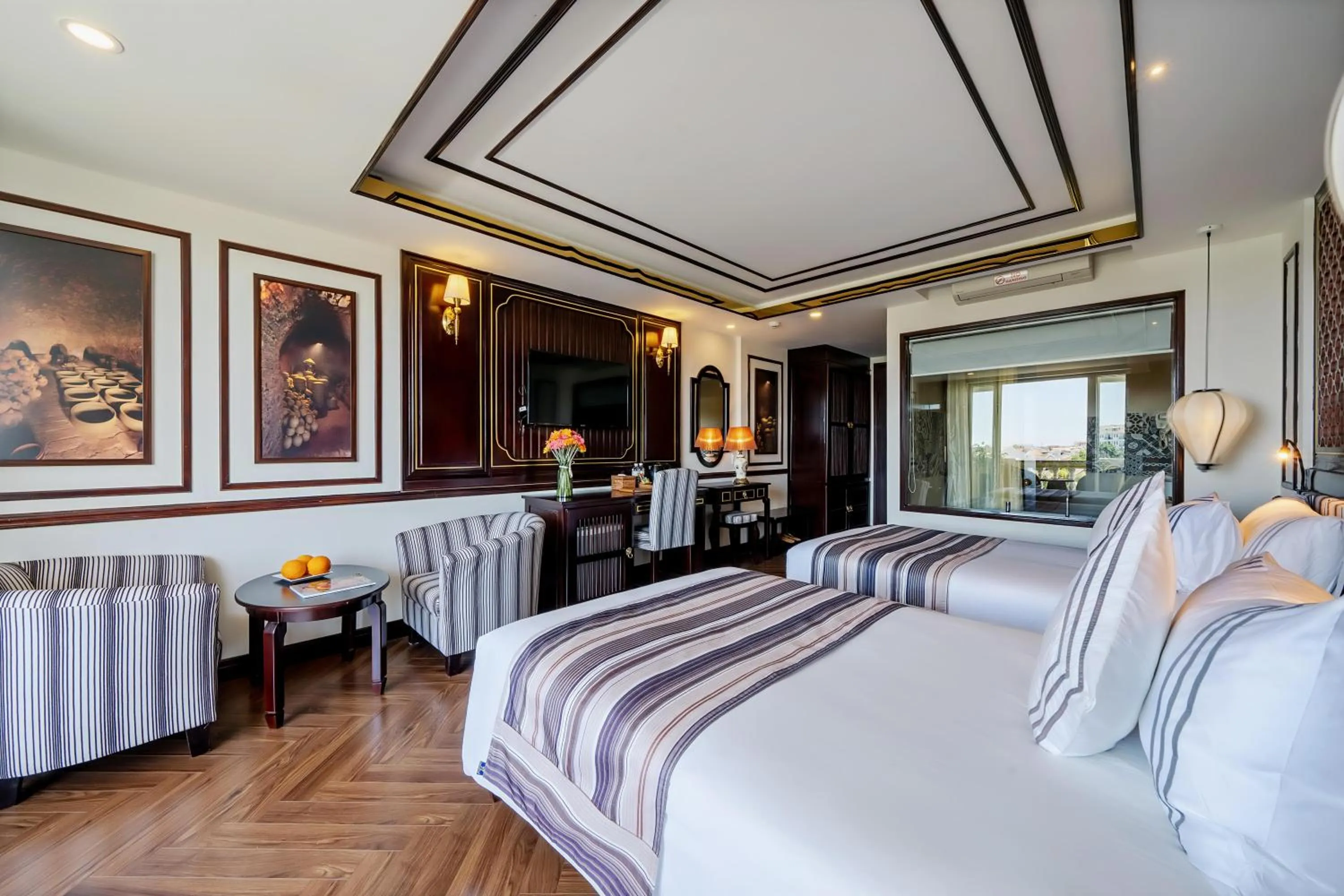 Bed in Le Pavillon Hoi An Luxury Resort & Spa