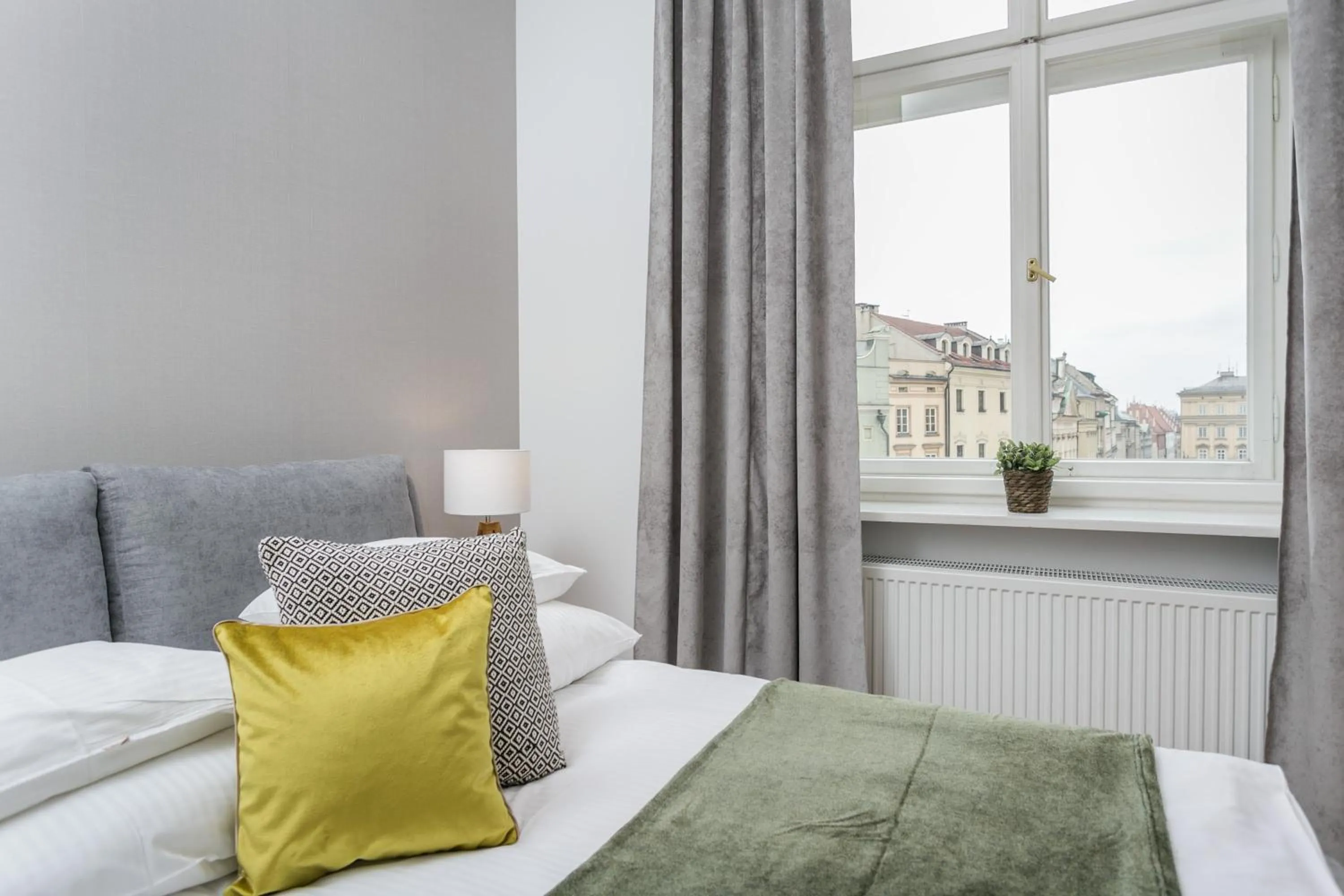 Decorative detail, Bed in Venetian House Market Square Aparthotel