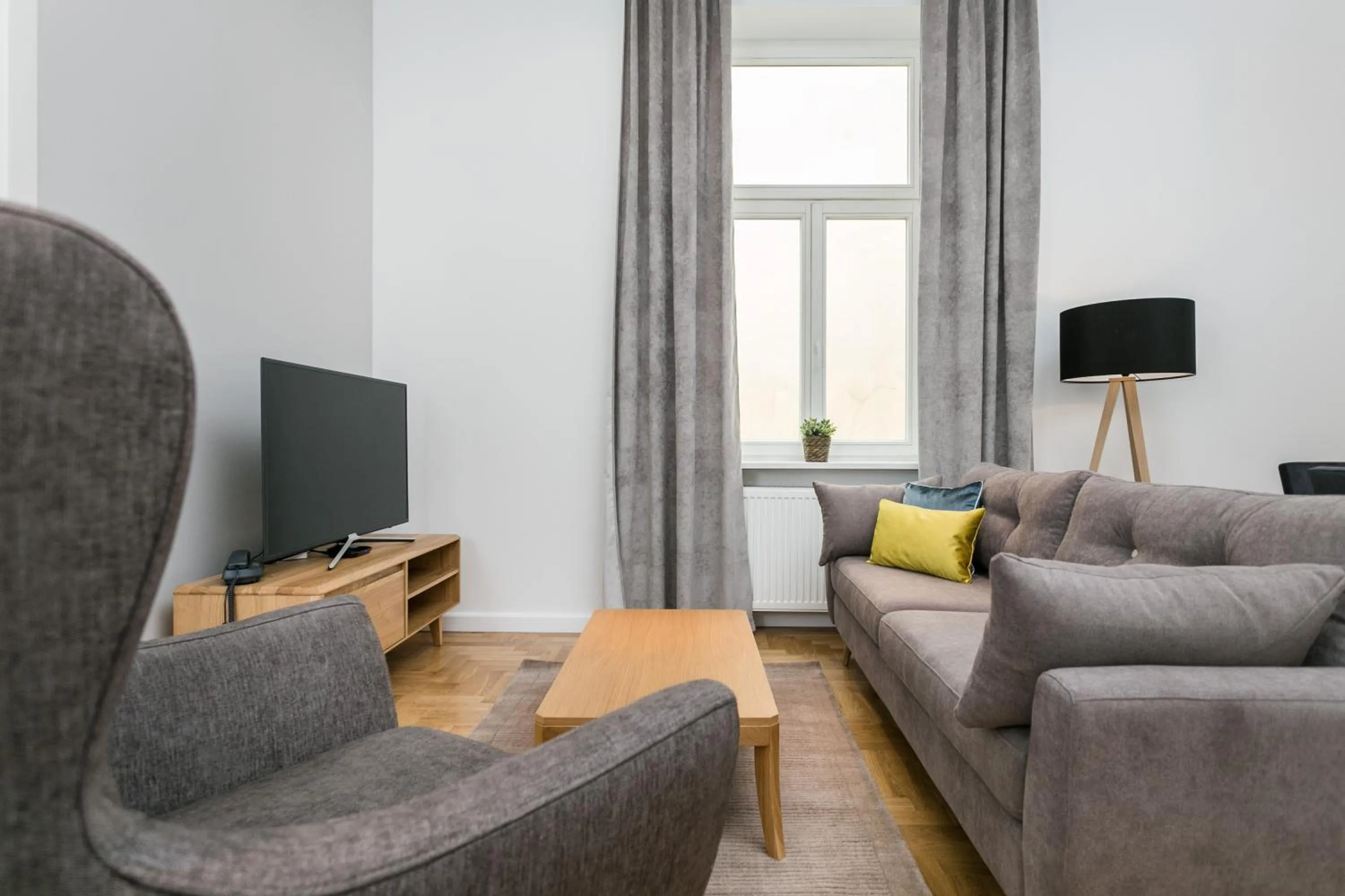 Seating area in Venetian House Market Square Aparthotel