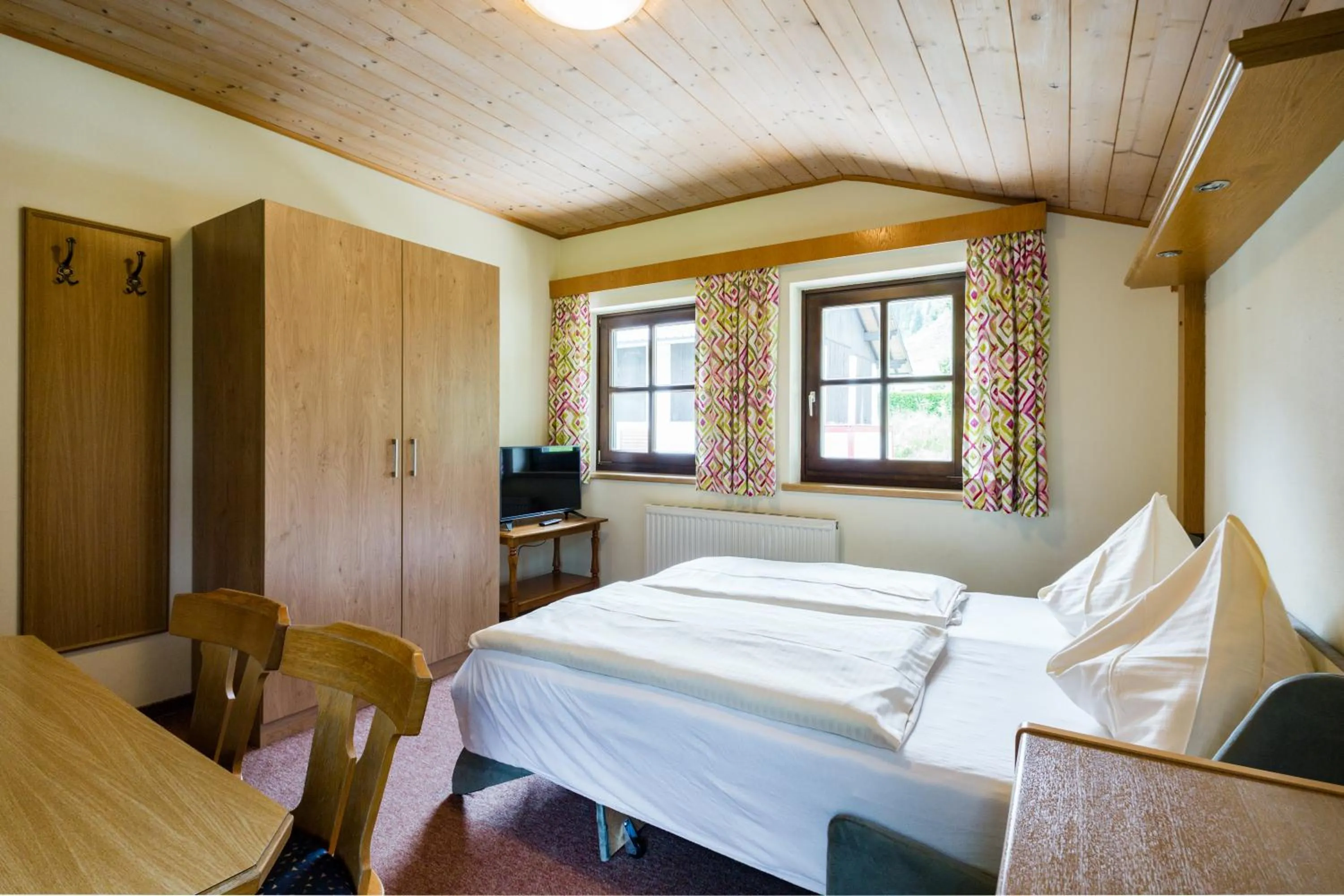 Living room, Bed in Appartements Tannenhof