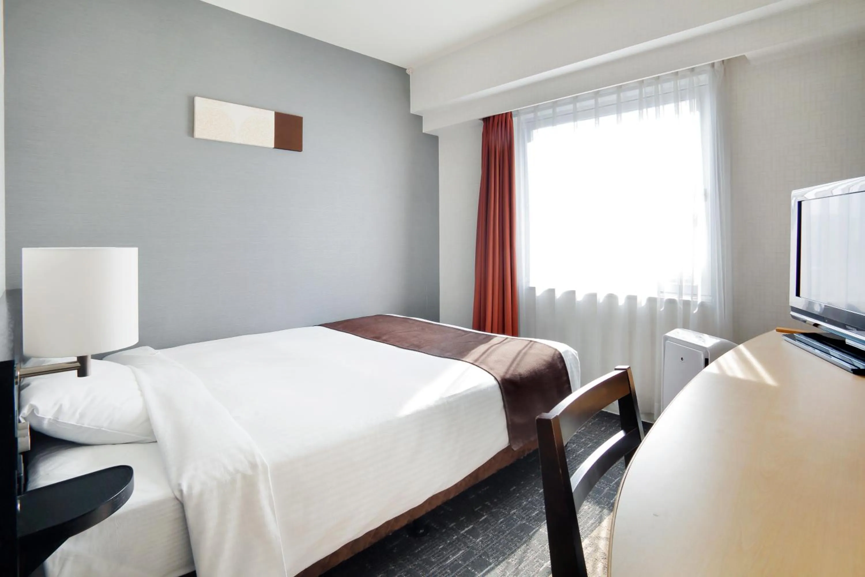 Photo of the whole room, Bed in Sapporo Tokyu REI Hotel