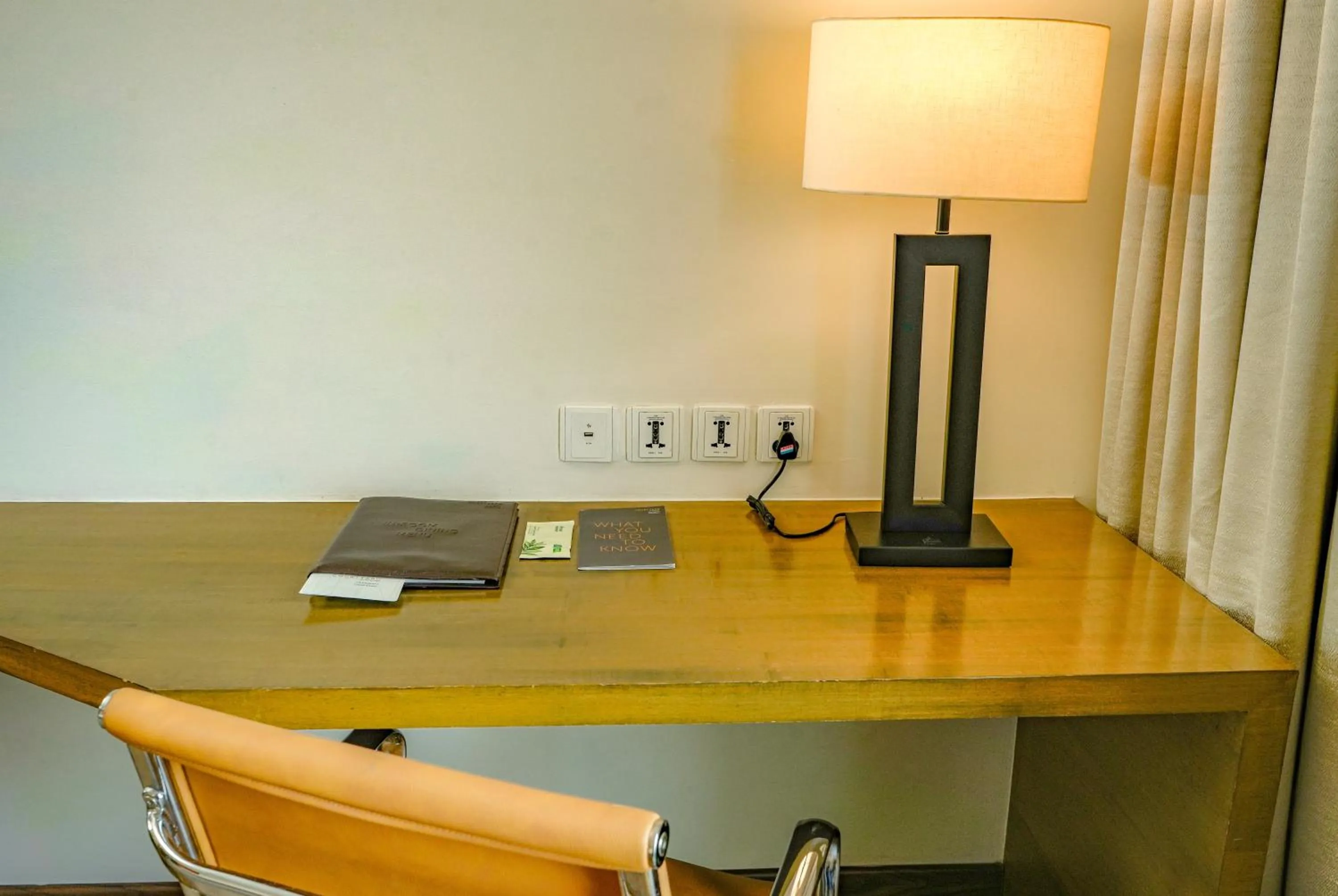 Seating area in Courtyard by Marriott Gurugram Downtown