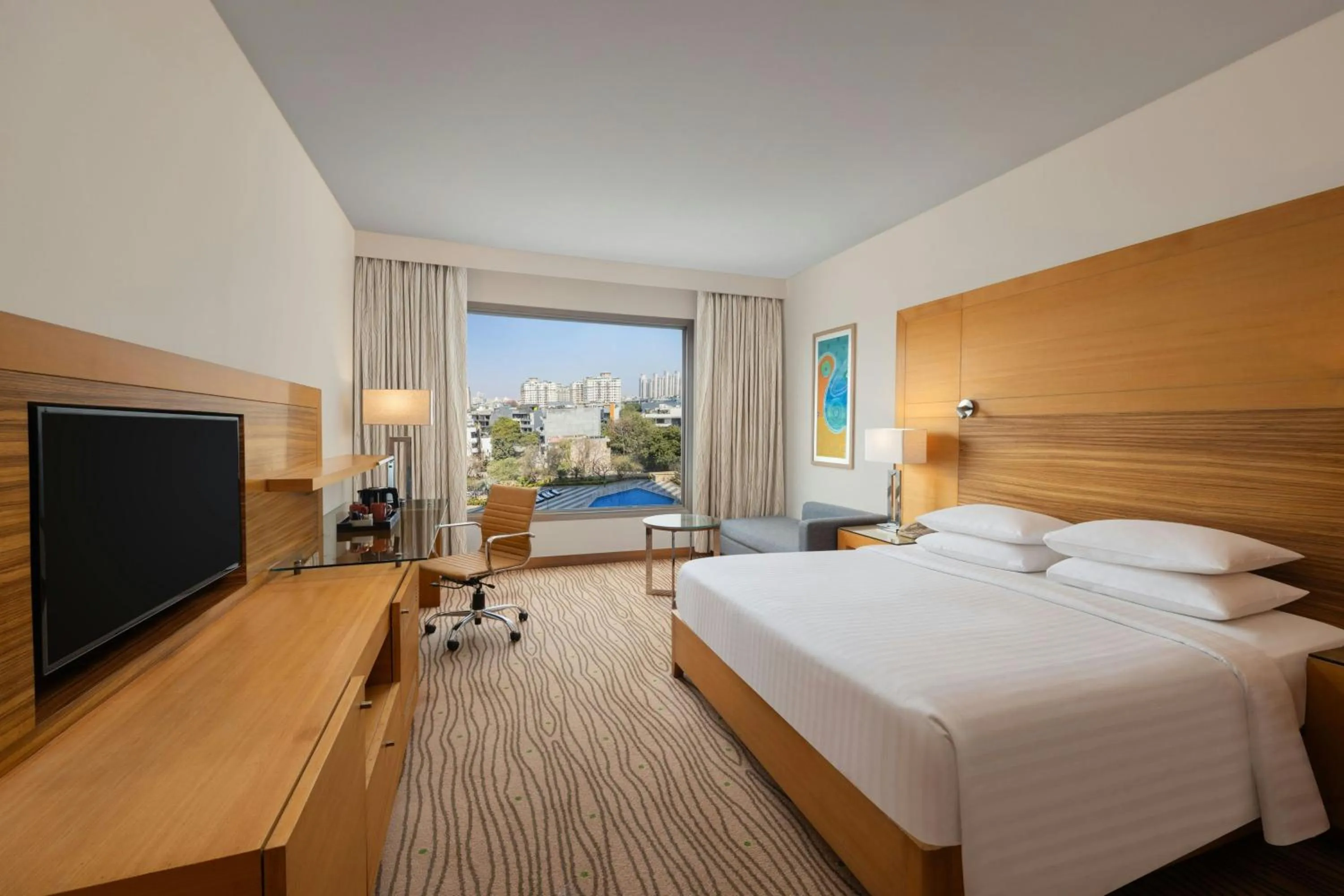 Swimming pool, Bed in Courtyard by Marriott Gurugram Downtown