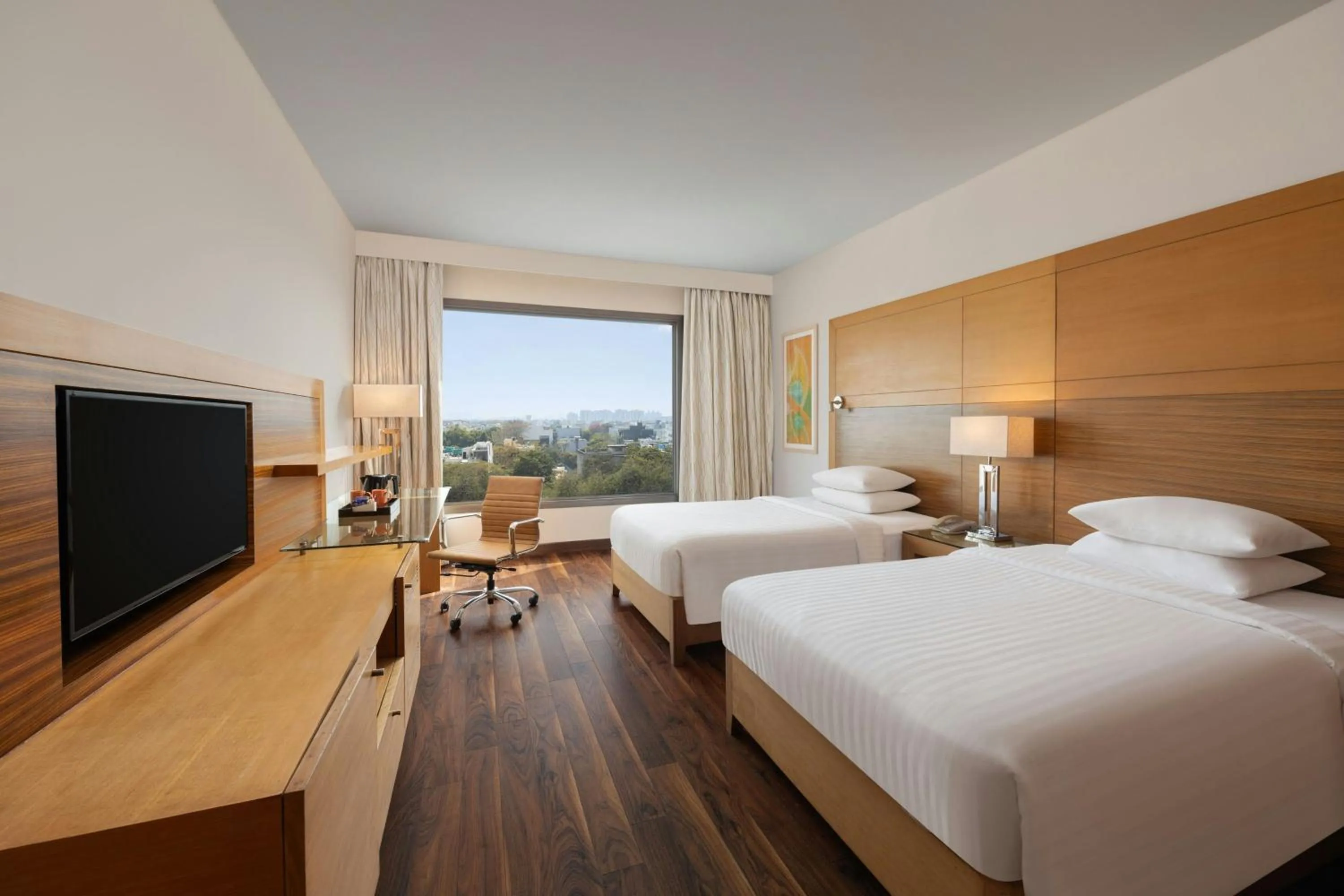 Photo of the whole room, Bed in Courtyard by Marriott Gurugram Downtown