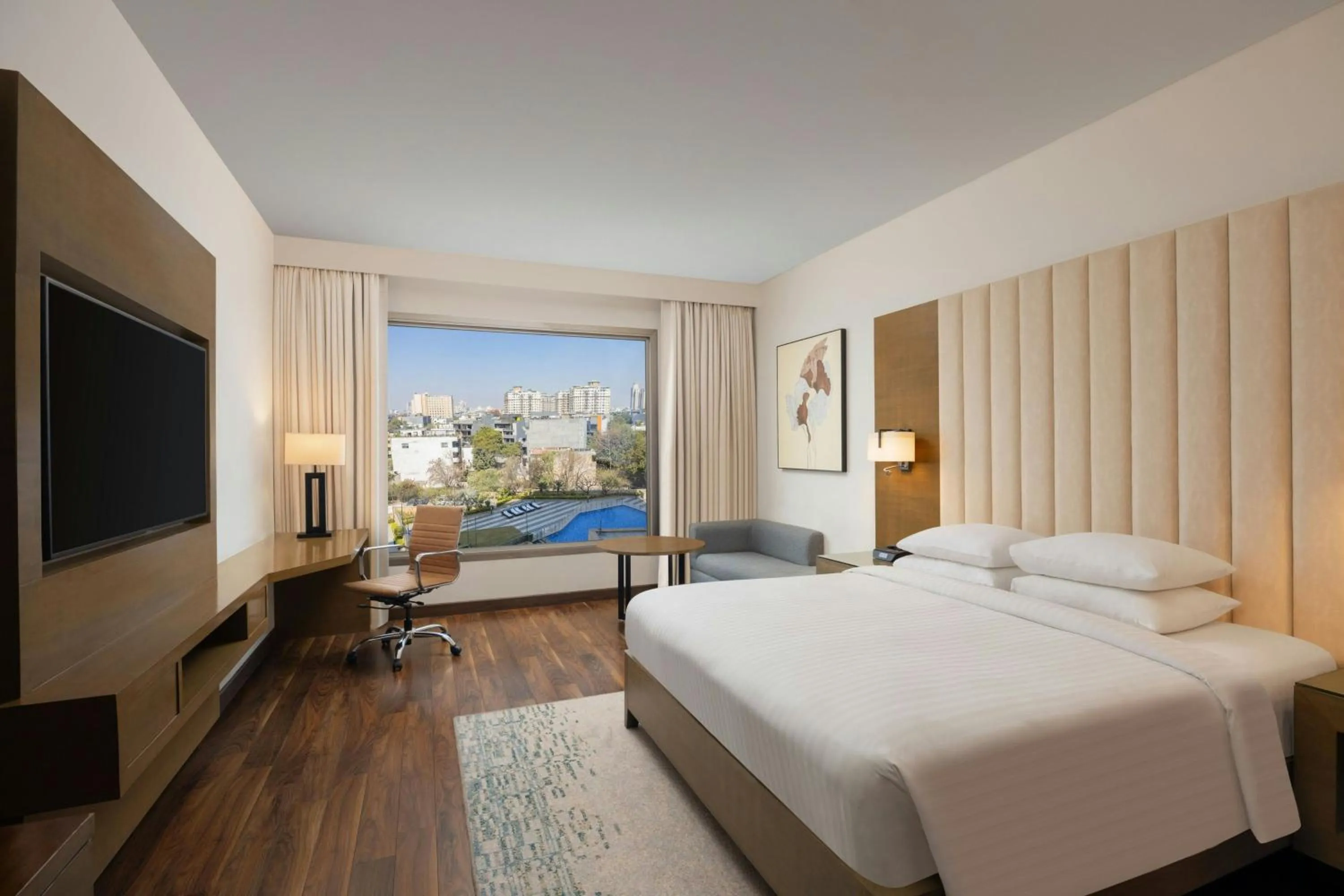 Swimming pool, Bed in Courtyard by Marriott Gurugram Downtown