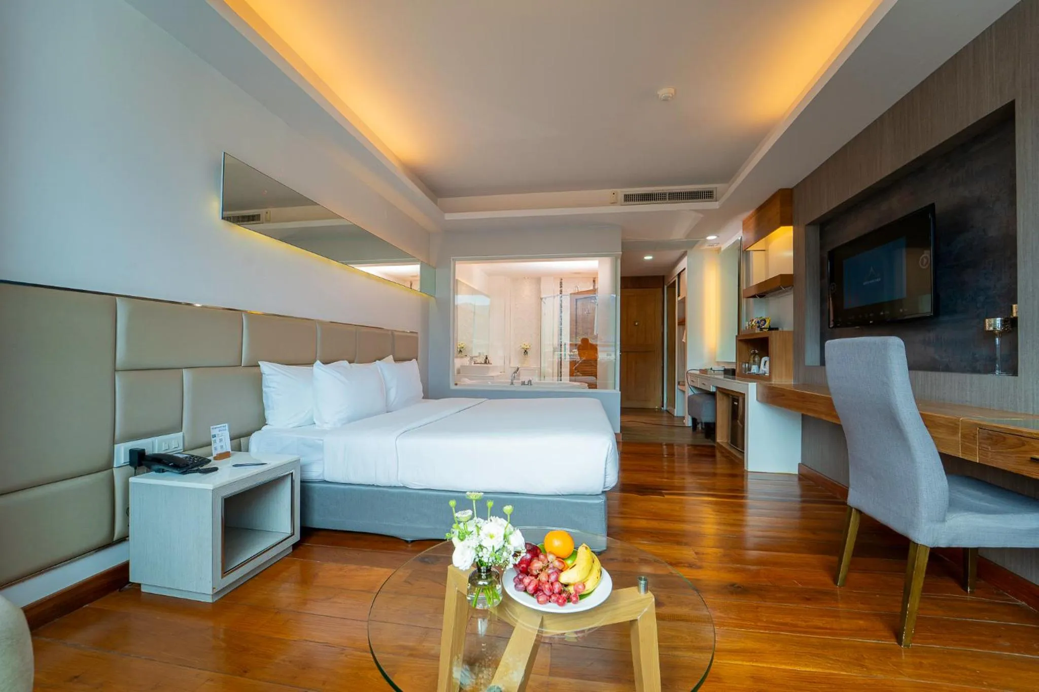 Photo of the whole room, Bed in Khum Phucome Hotel -SHA Extra Plus