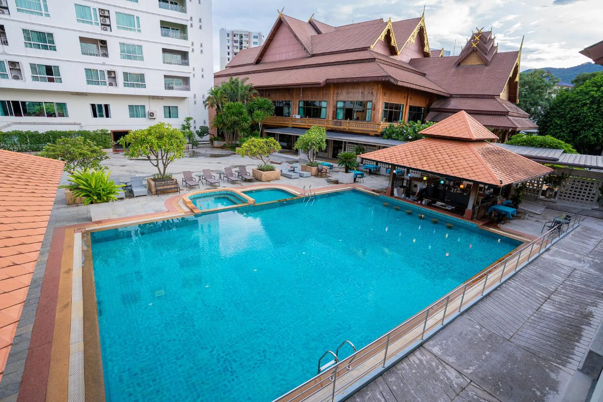 Swimming pool in Khum Phucome Hotel -SHA Extra Plus