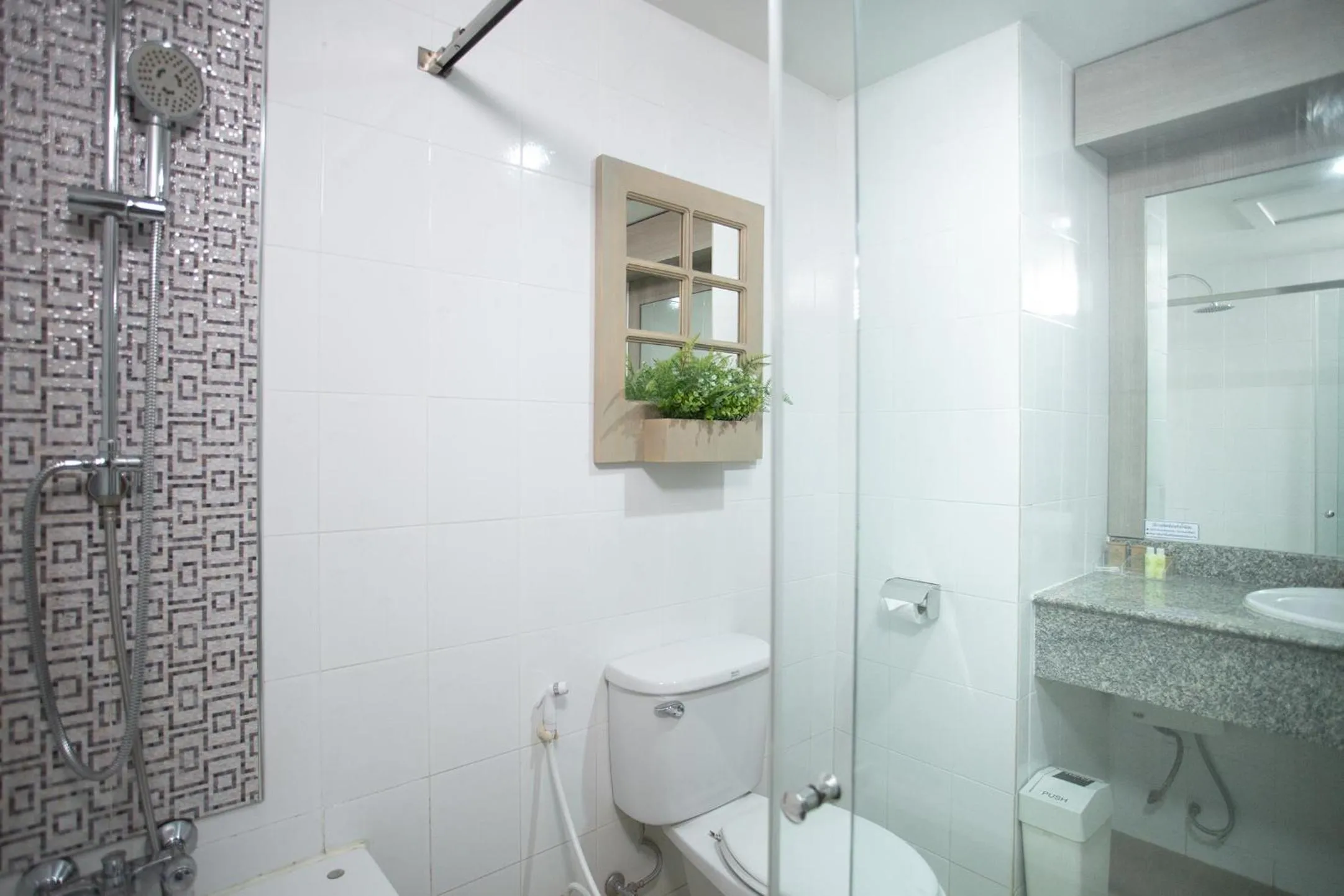 Bathroom in Khum Phucome Hotel -SHA Extra Plus