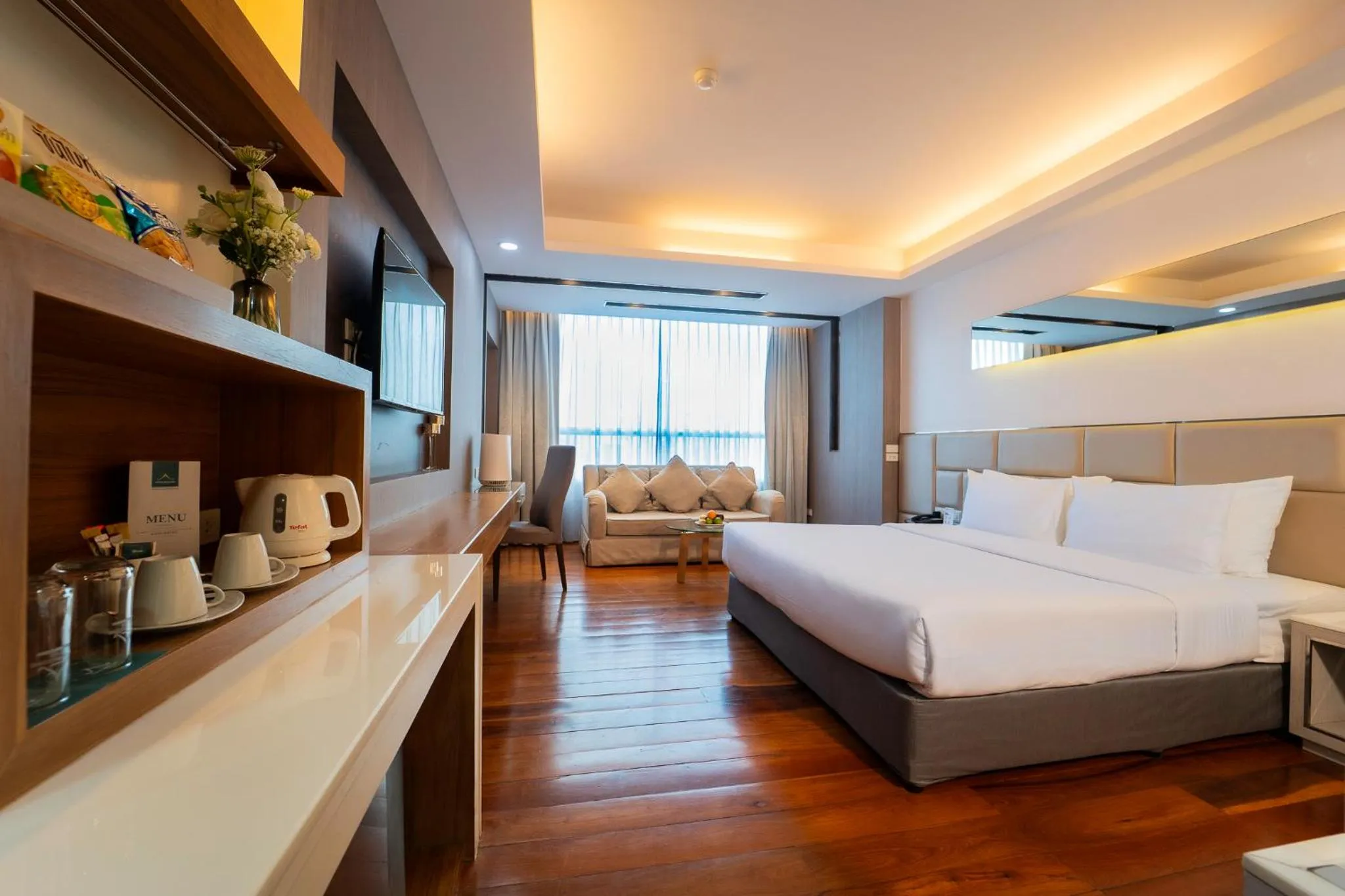 Photo of the whole room, Bed in Khum Phucome Hotel -SHA Extra Plus