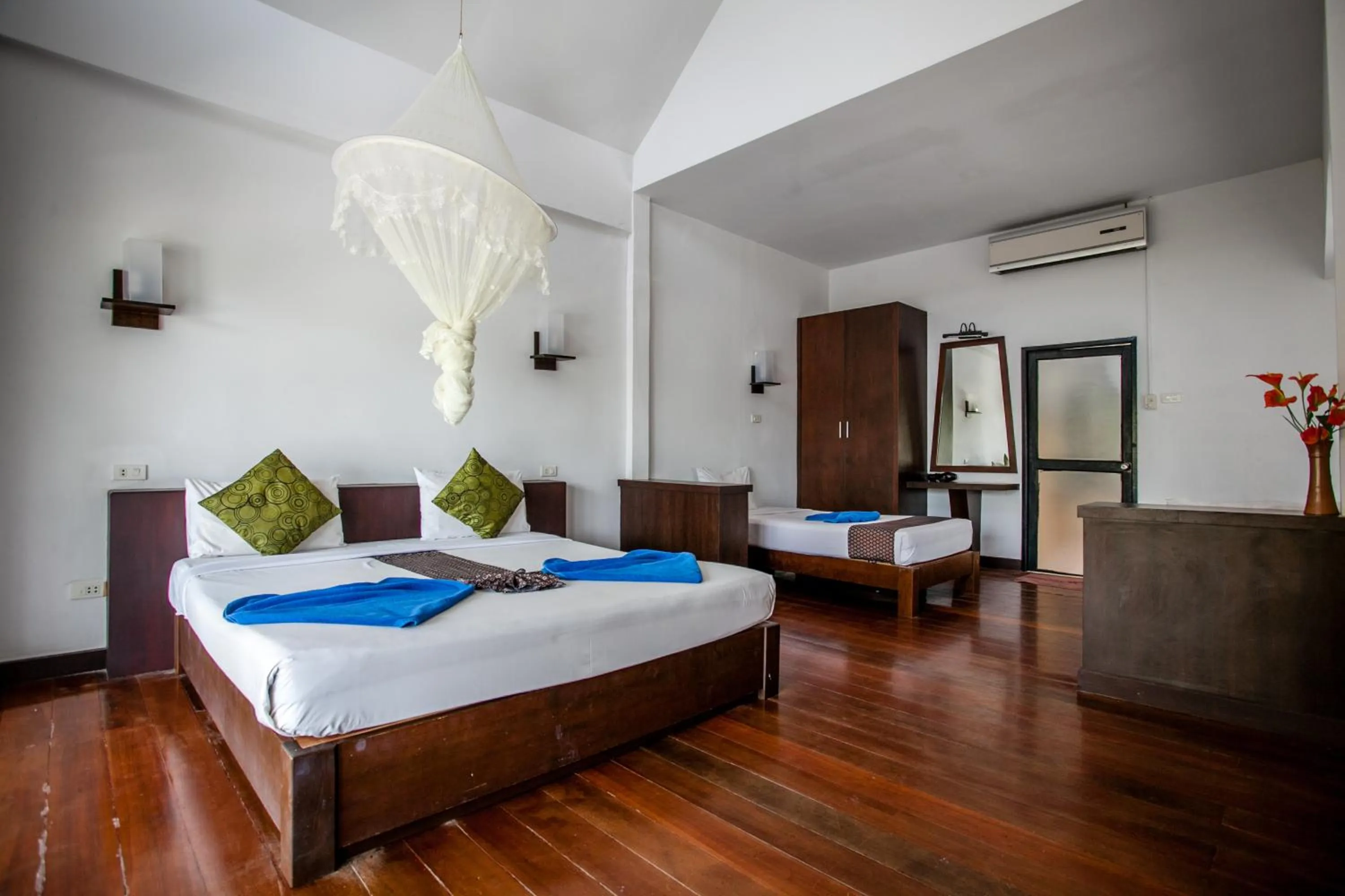 Bed in Phitharom PP Resort