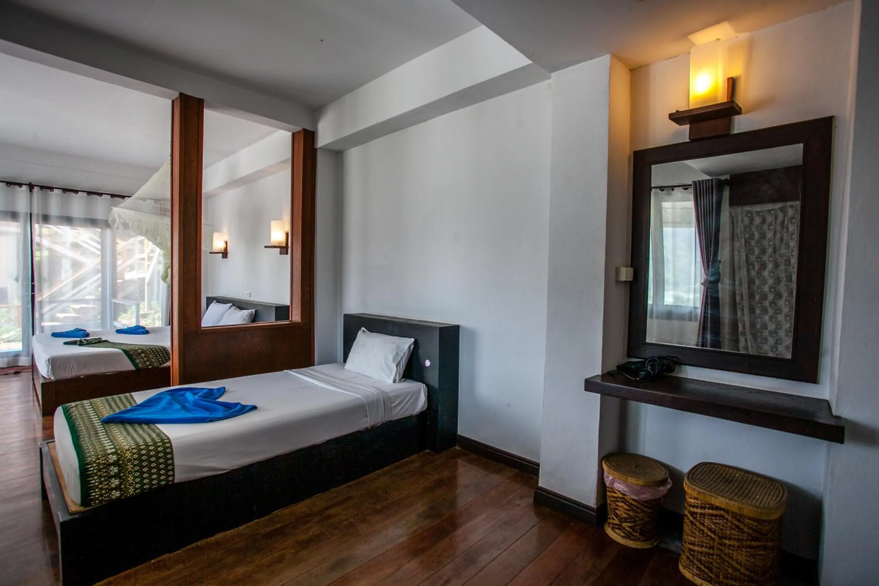 Bed in Phitharom PP Resort