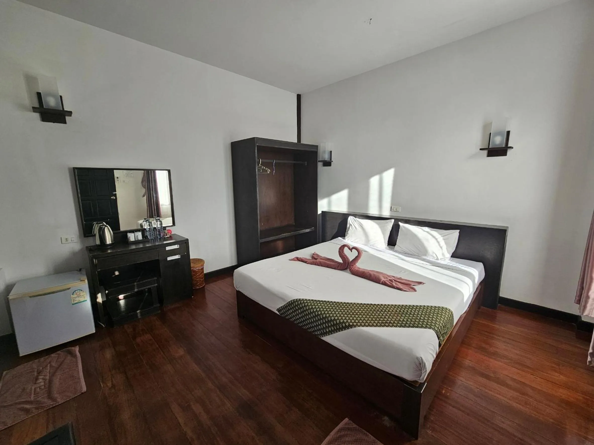 Bed in Phitharom PP Resort