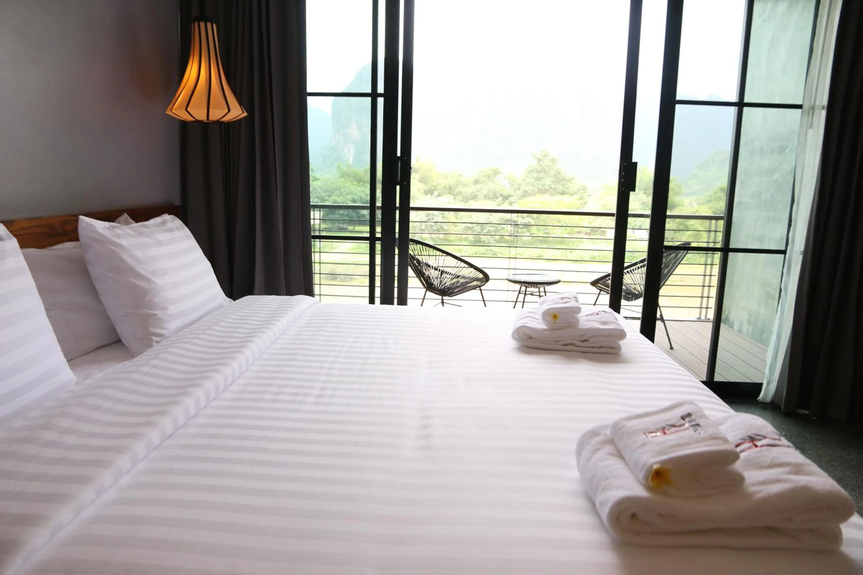 Shower, Bed in Inthira Vangvieng