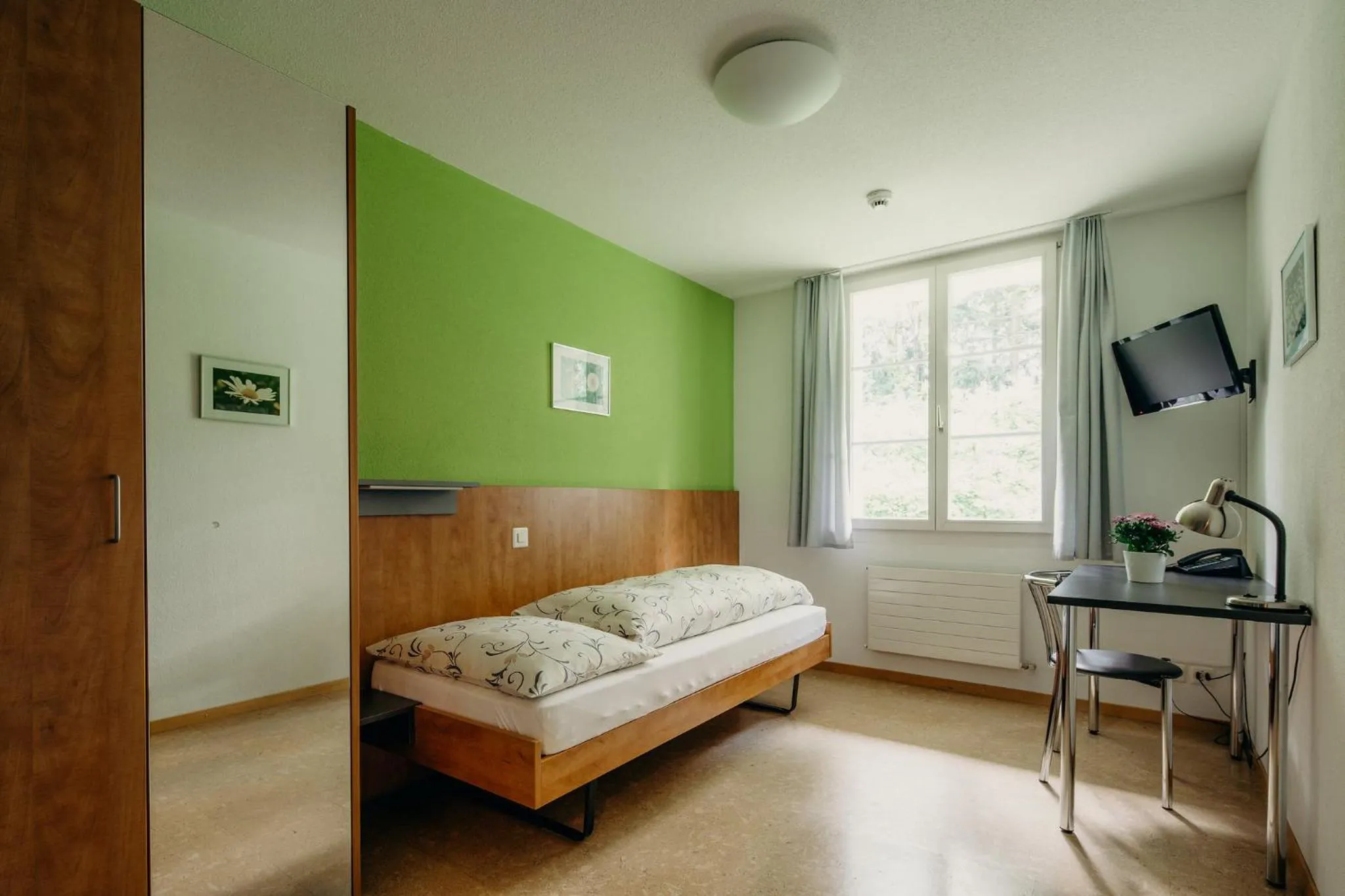Photo of the whole room, Bed in Bienenberg - Das Genusshotel im Grünen - Liestal