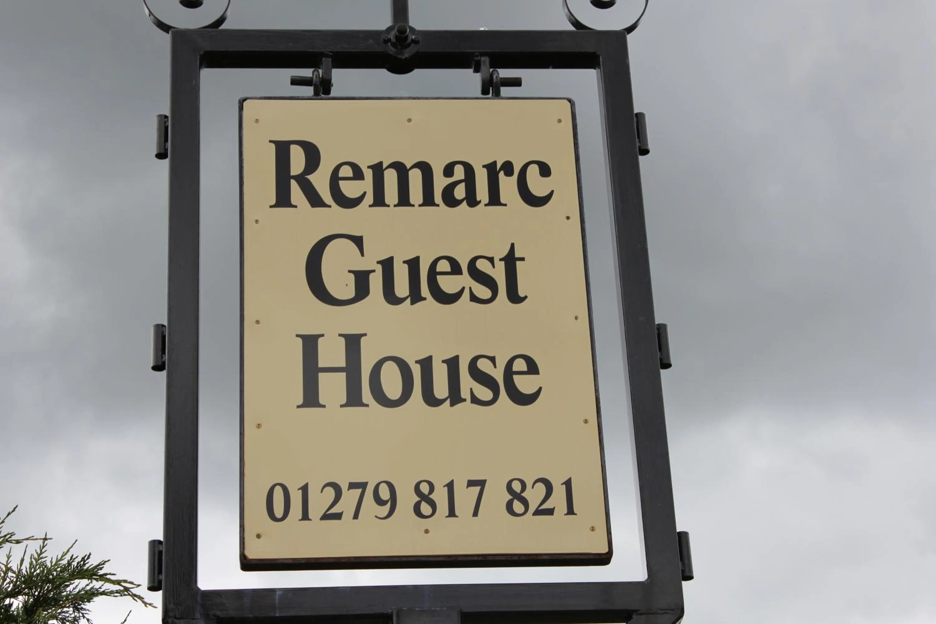 Property logo or sign in Remarc Guest House