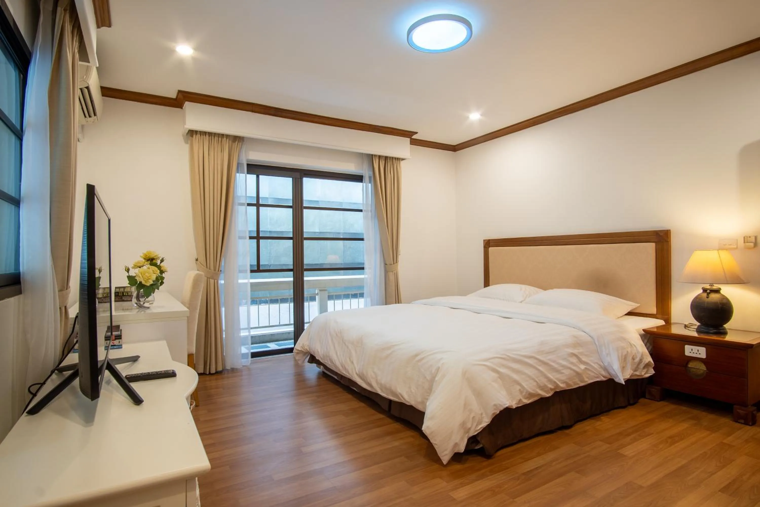 Bed in Oriental Palace Apartments Hanoi