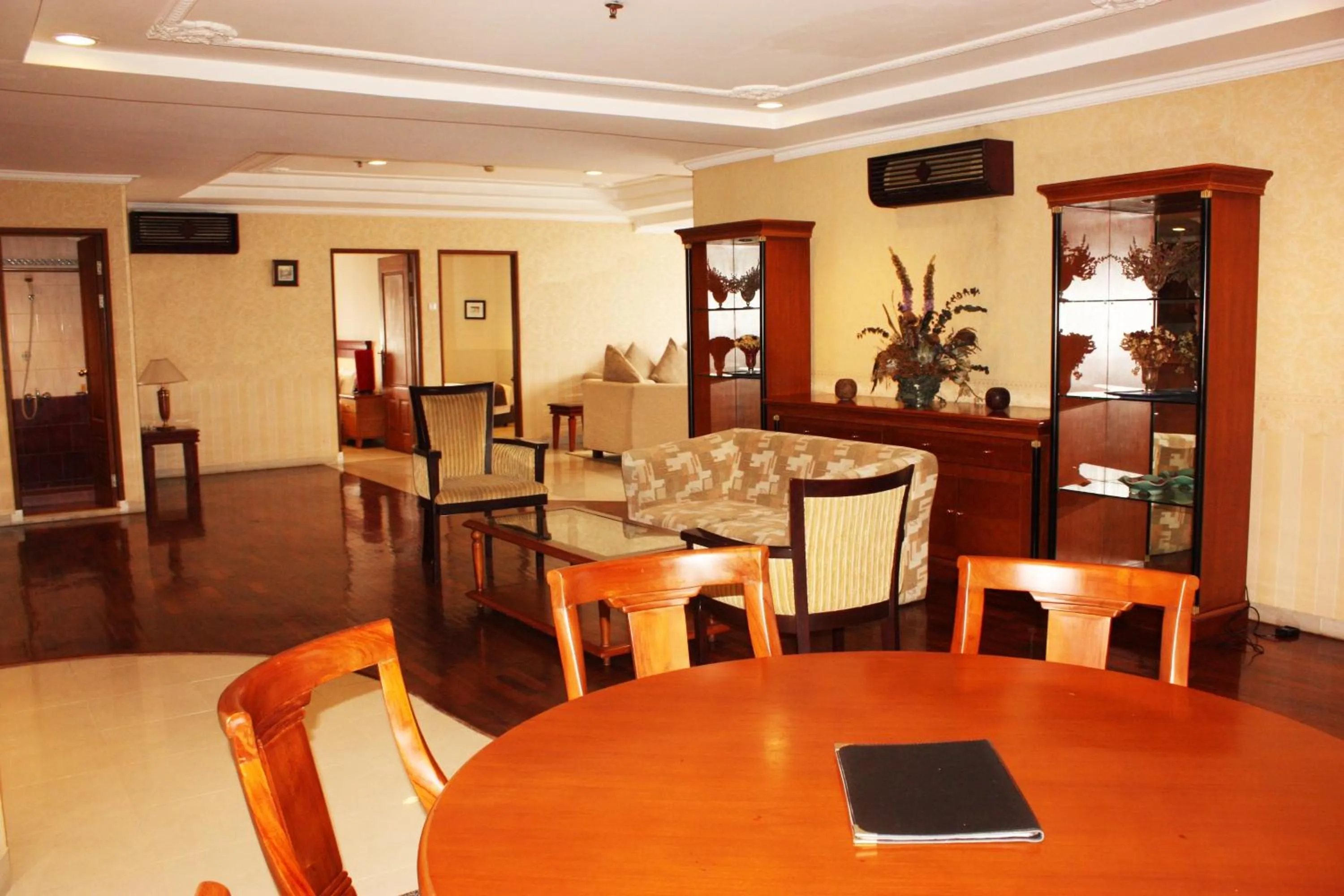 Dining area in Travellers Suites Serviced Apartments