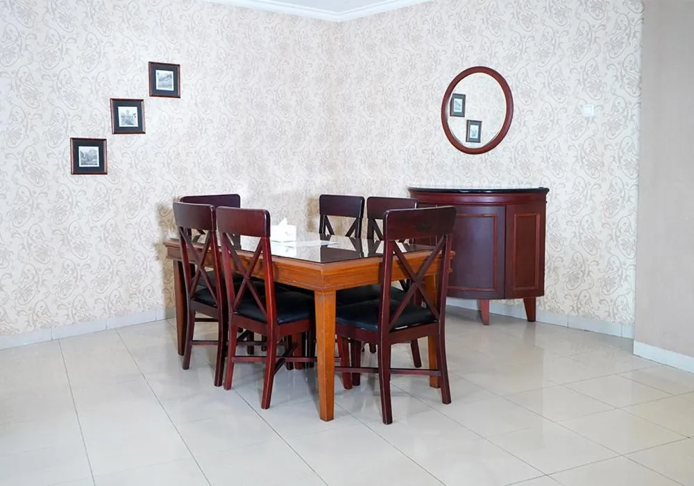 Dining area in Travellers Suites Serviced Apartments