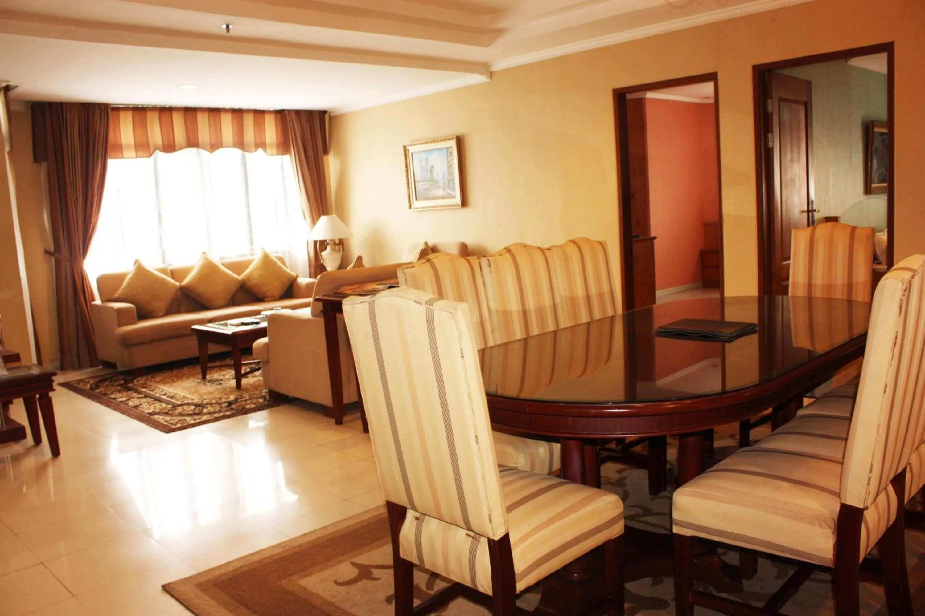 Living room in Travellers Suites Serviced Apartments