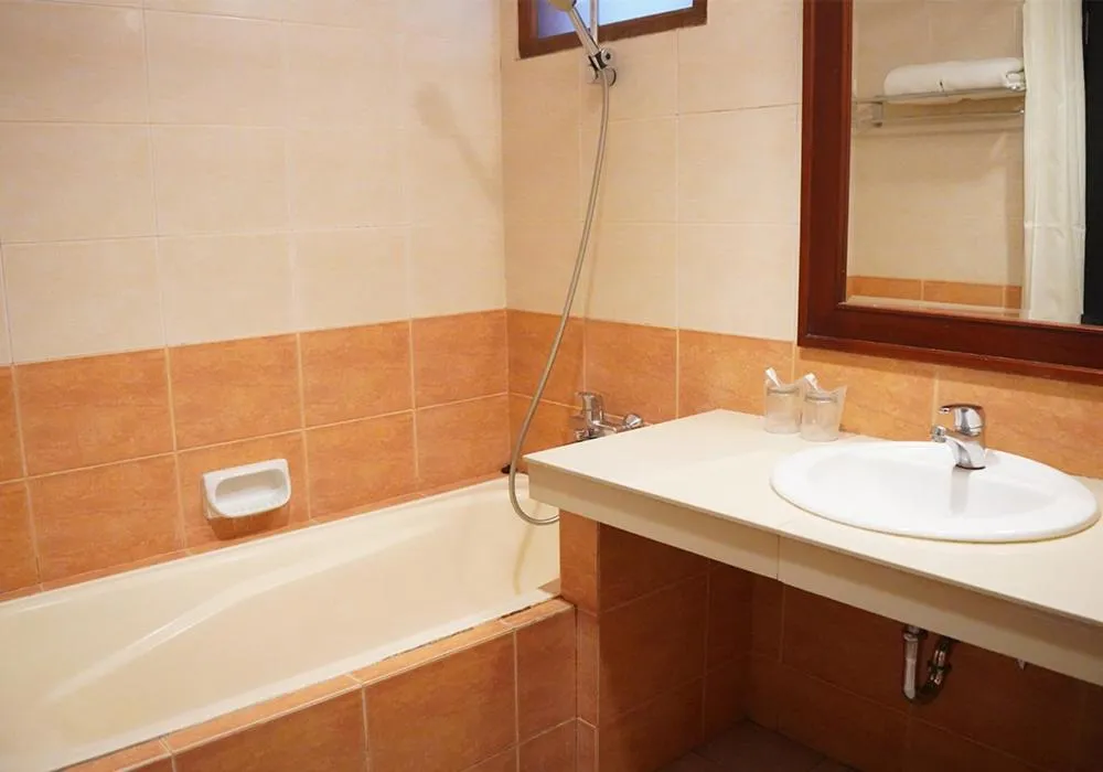 Bathroom in Travellers Suites Serviced Apartments