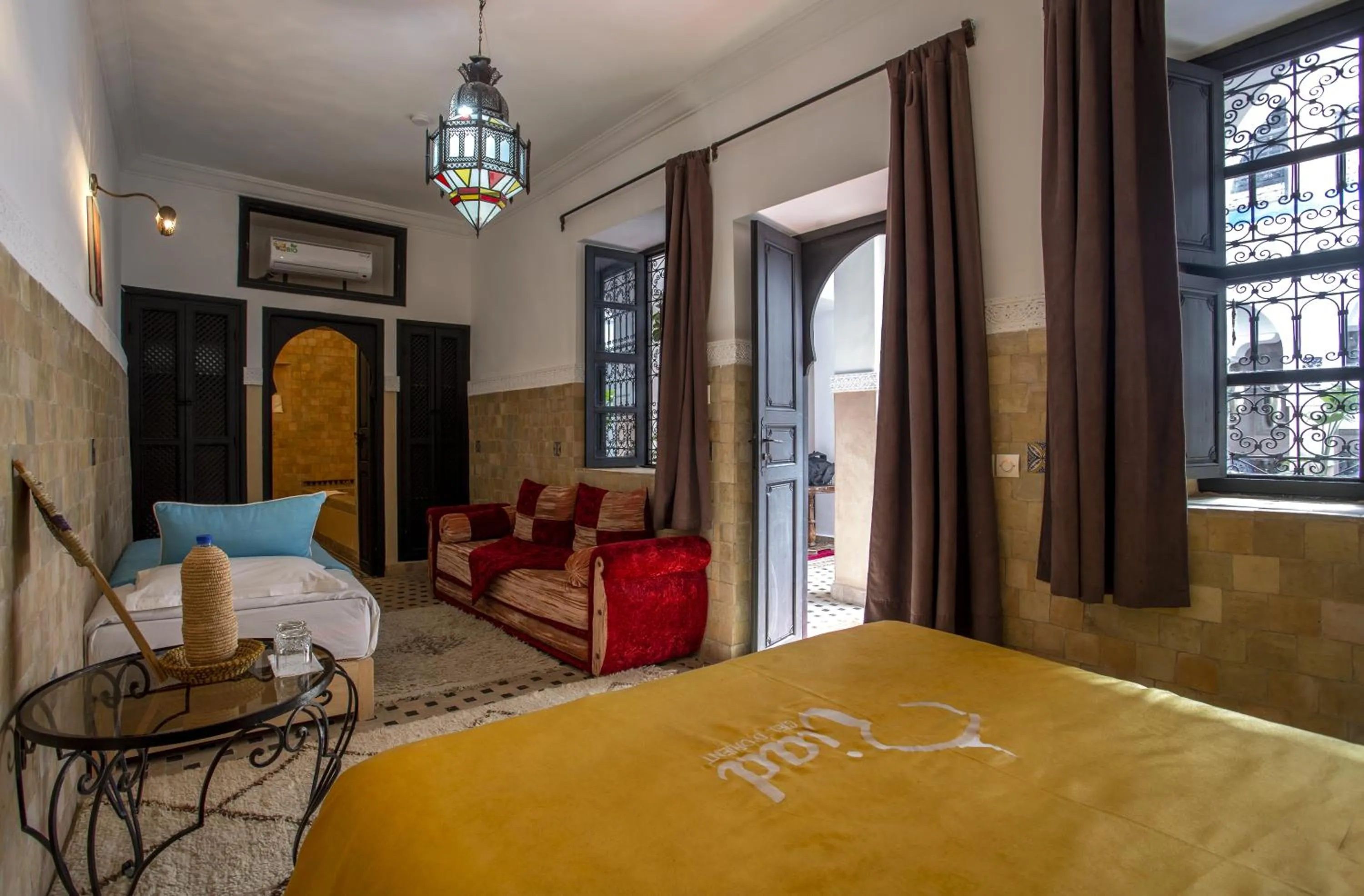 Bed in Riad Ciel d'Orient