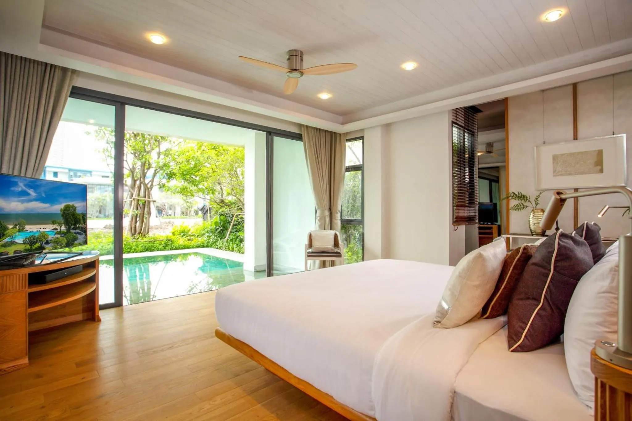 Bed in Baba Beach Club Hua Hin Luxury Pool Villa by Sri panwa