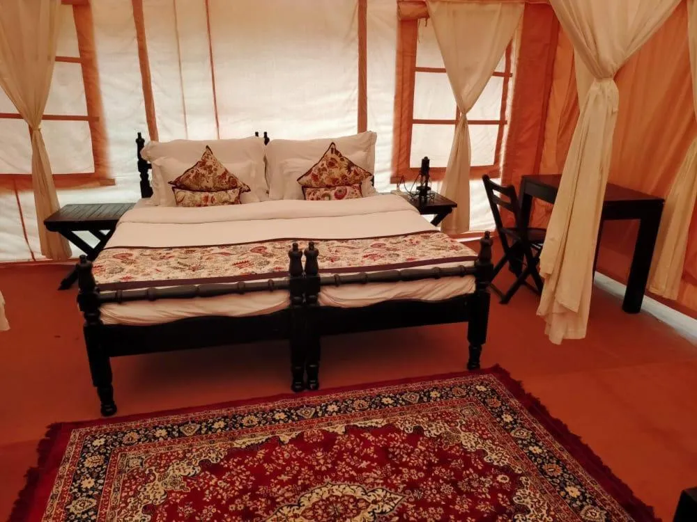 Bed in Dhora Desert Resort And Spa