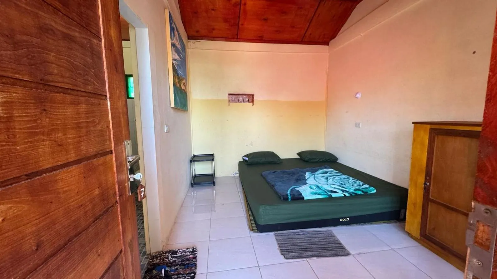 Bed in Aman's Guesthouse