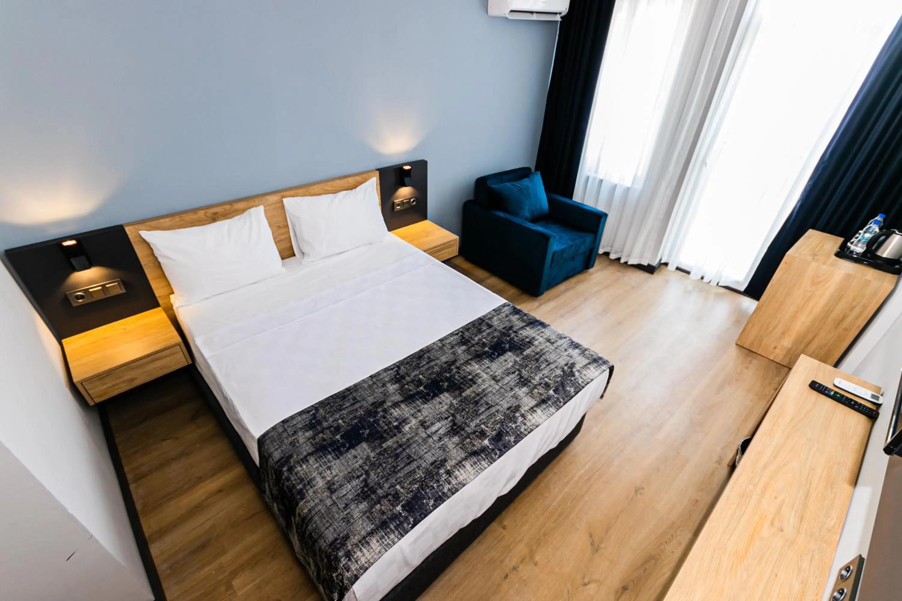 Bed in Lara World Hotel