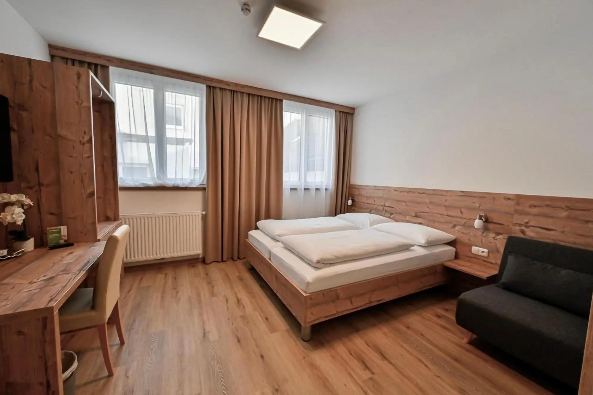 Bed in Hotel "City Rooms Wels"