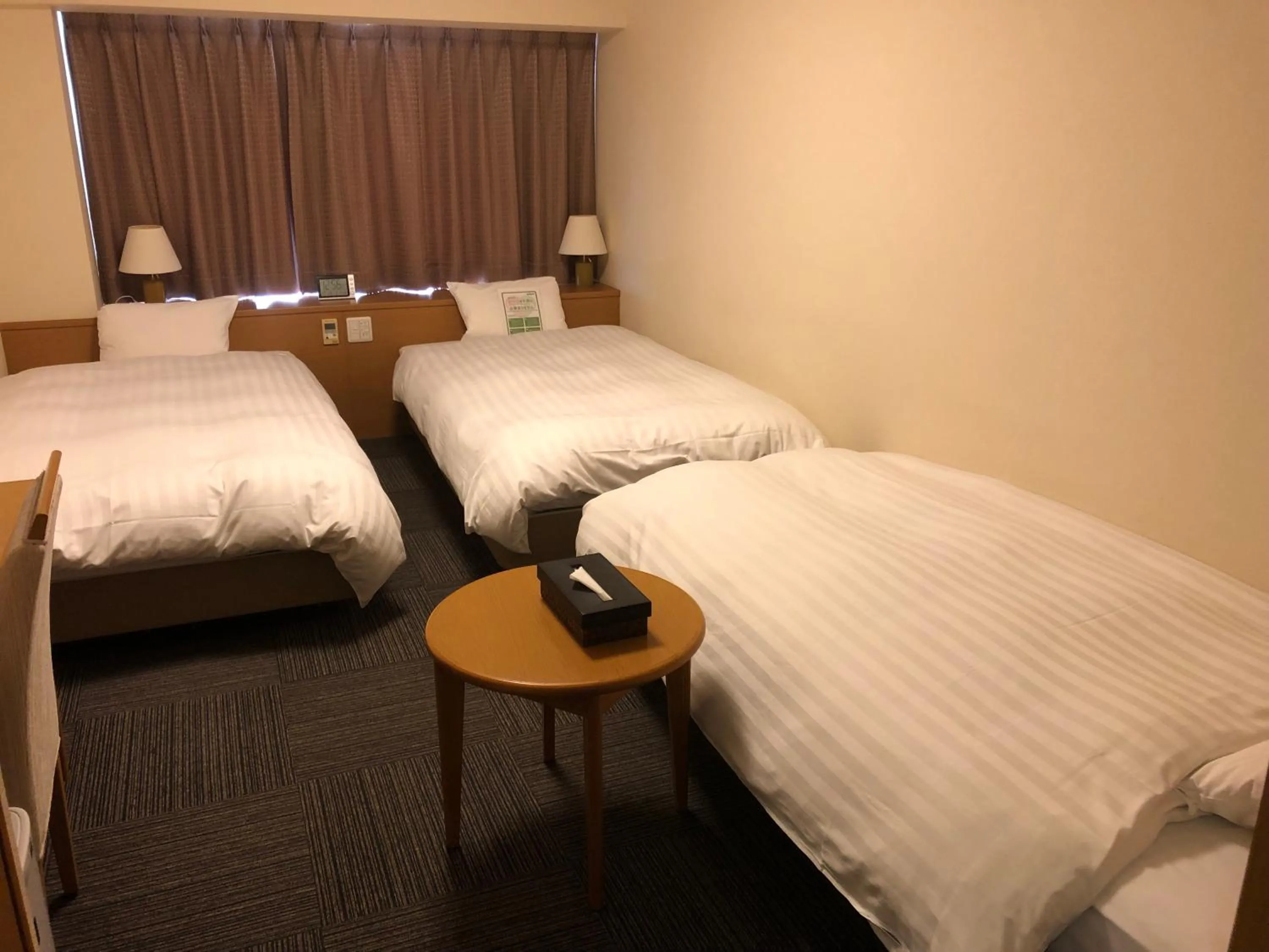 Bedroom, Bed in Dormy Inn PREMIUM Kushiro