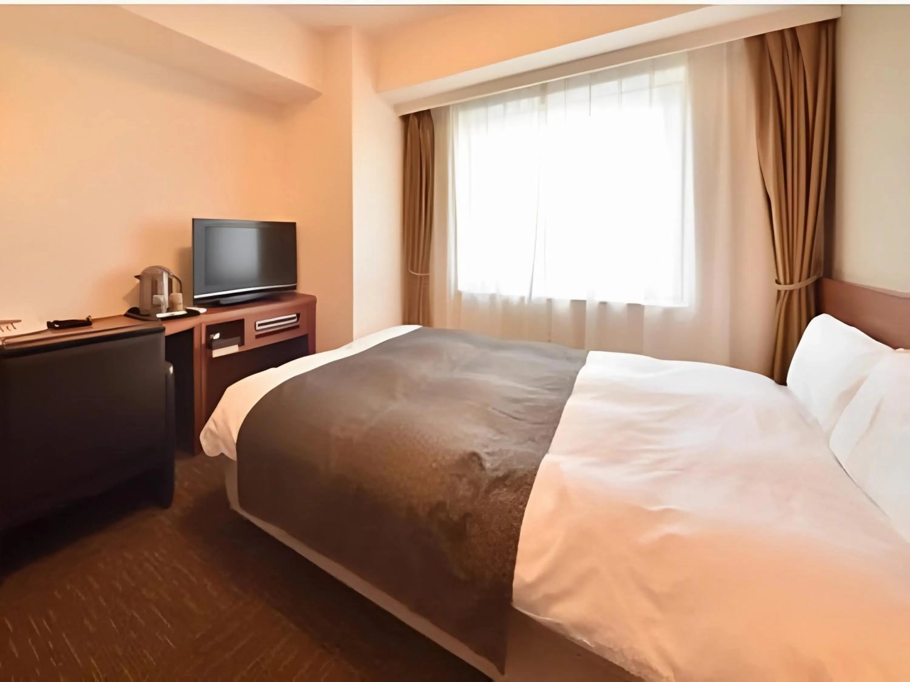 Bedroom, Bed in Dormy Inn Tomakomai