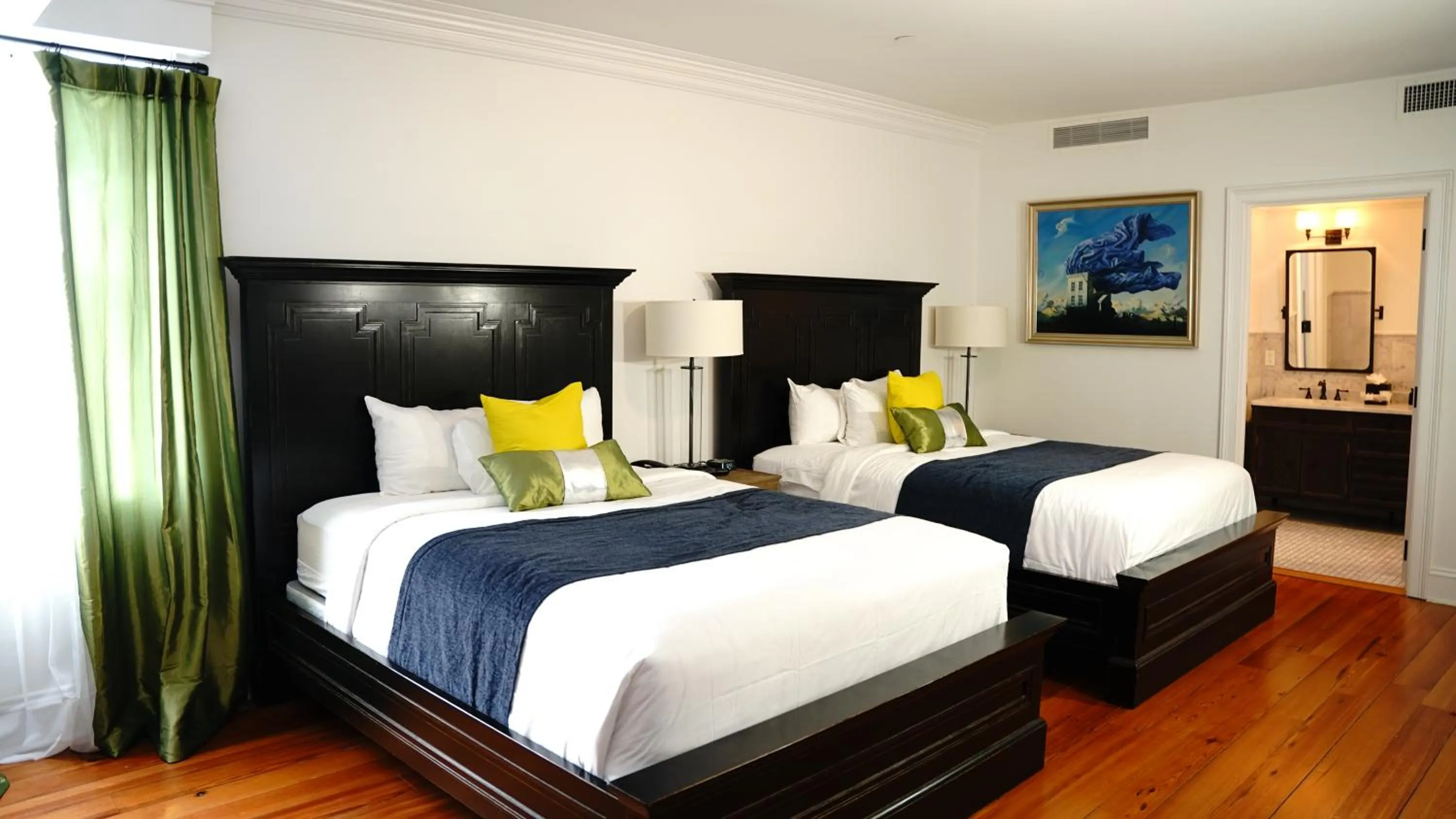 Bed in Royal Frenchmen Hotel and Bar