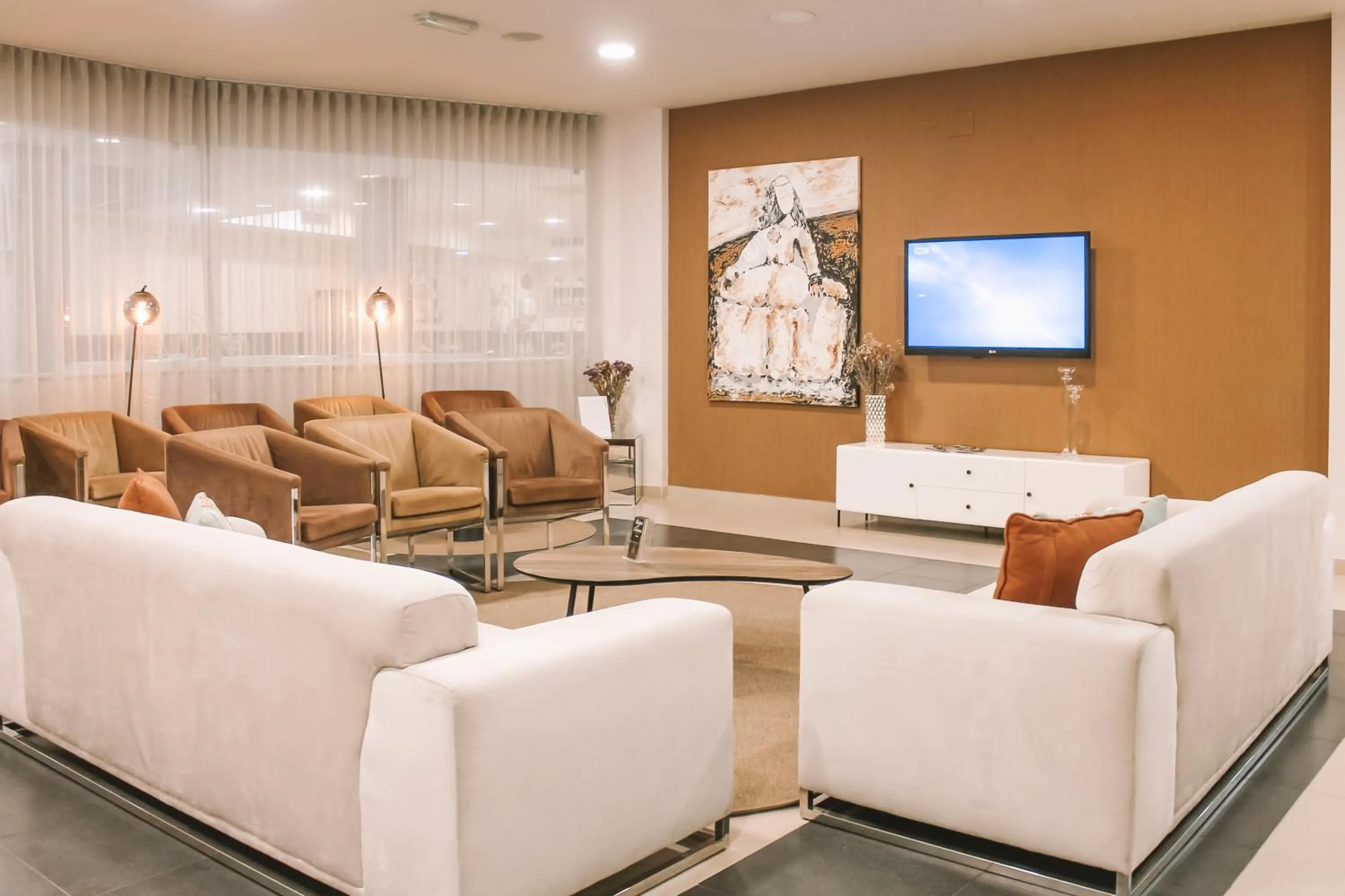 Lobby or reception in Vitoria Hotel