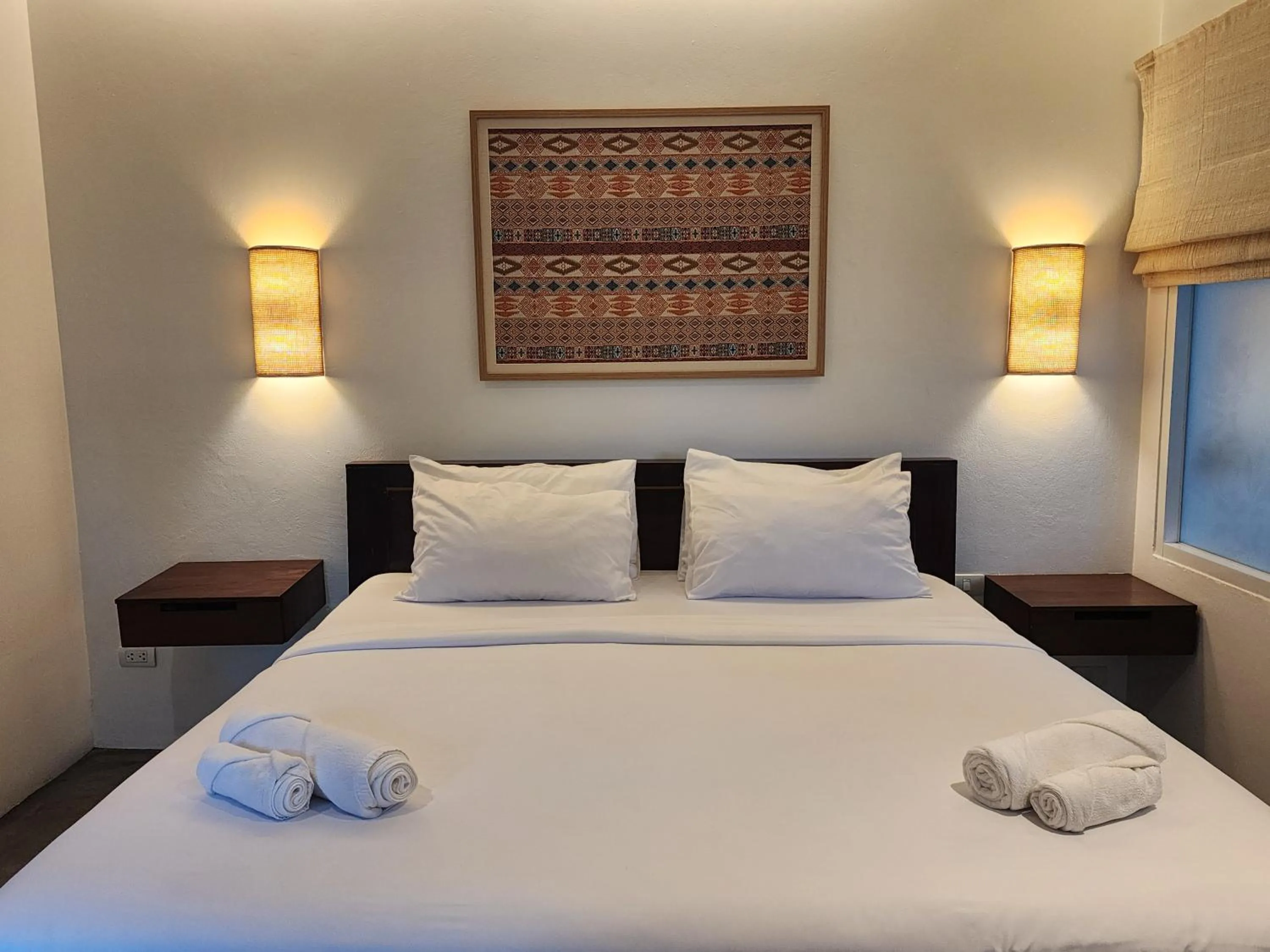 Bed in The Peaberry Boutique Hotel