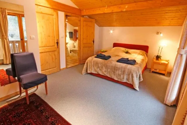 Bed in Hôtel et Chalet Au Coin Du Feu Chilly Powder