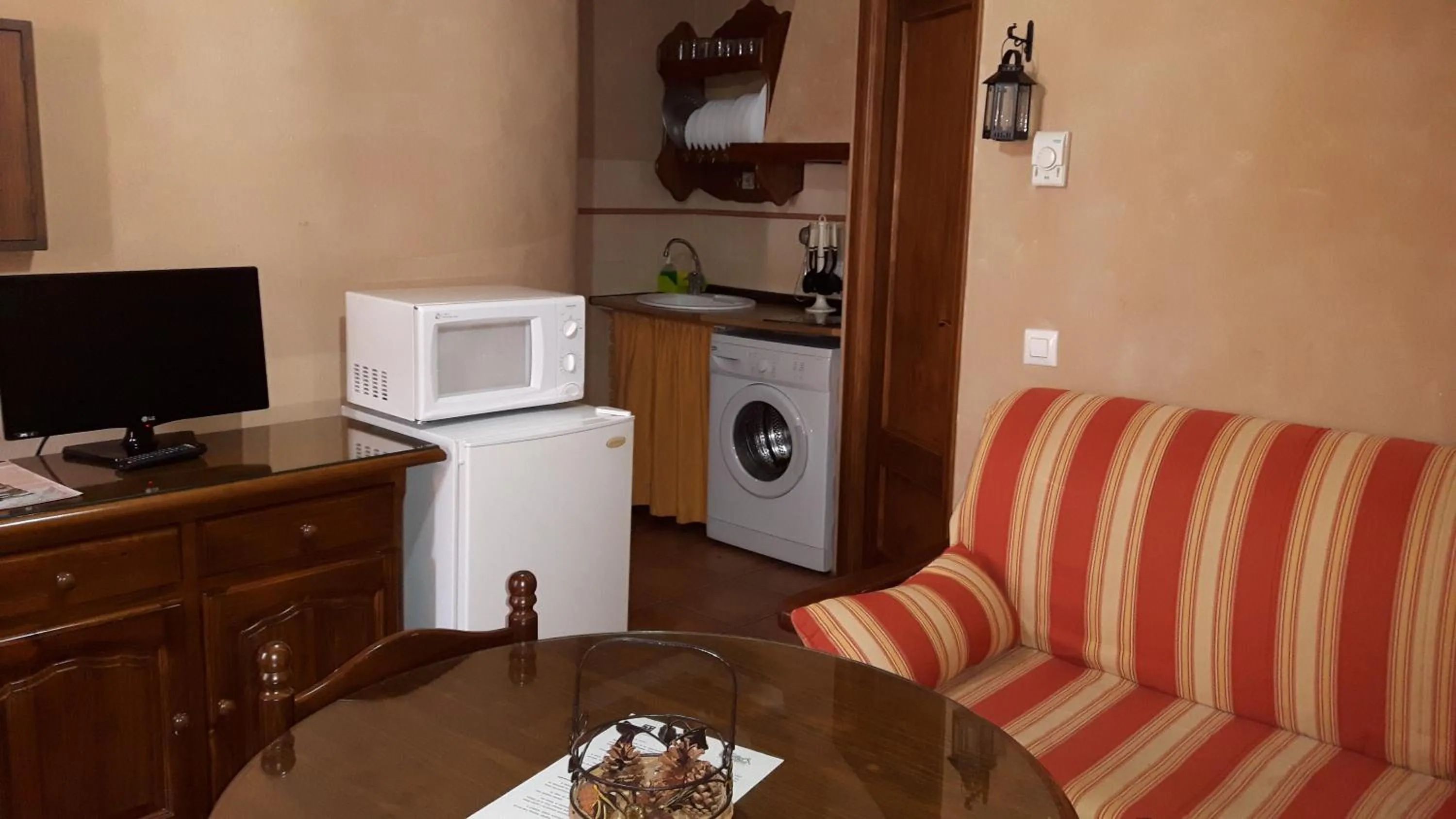 Kitchen or kitchenette in Apartamentos Valle del Guadalquivir
