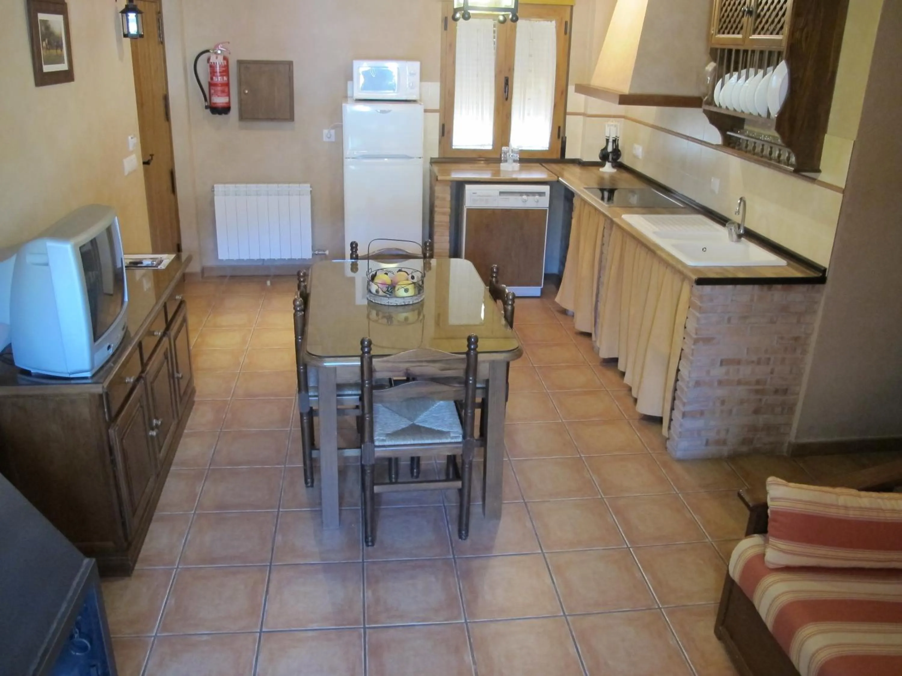 Kitchen or kitchenette in Apartamentos Valle del Guadalquivir