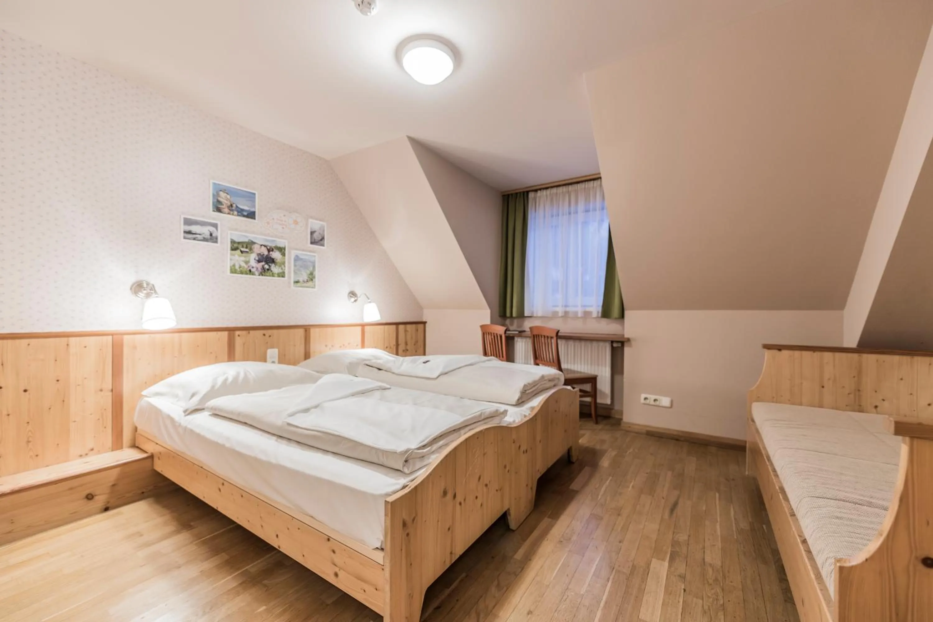 Bed in JUFA Hotel Grundlsee