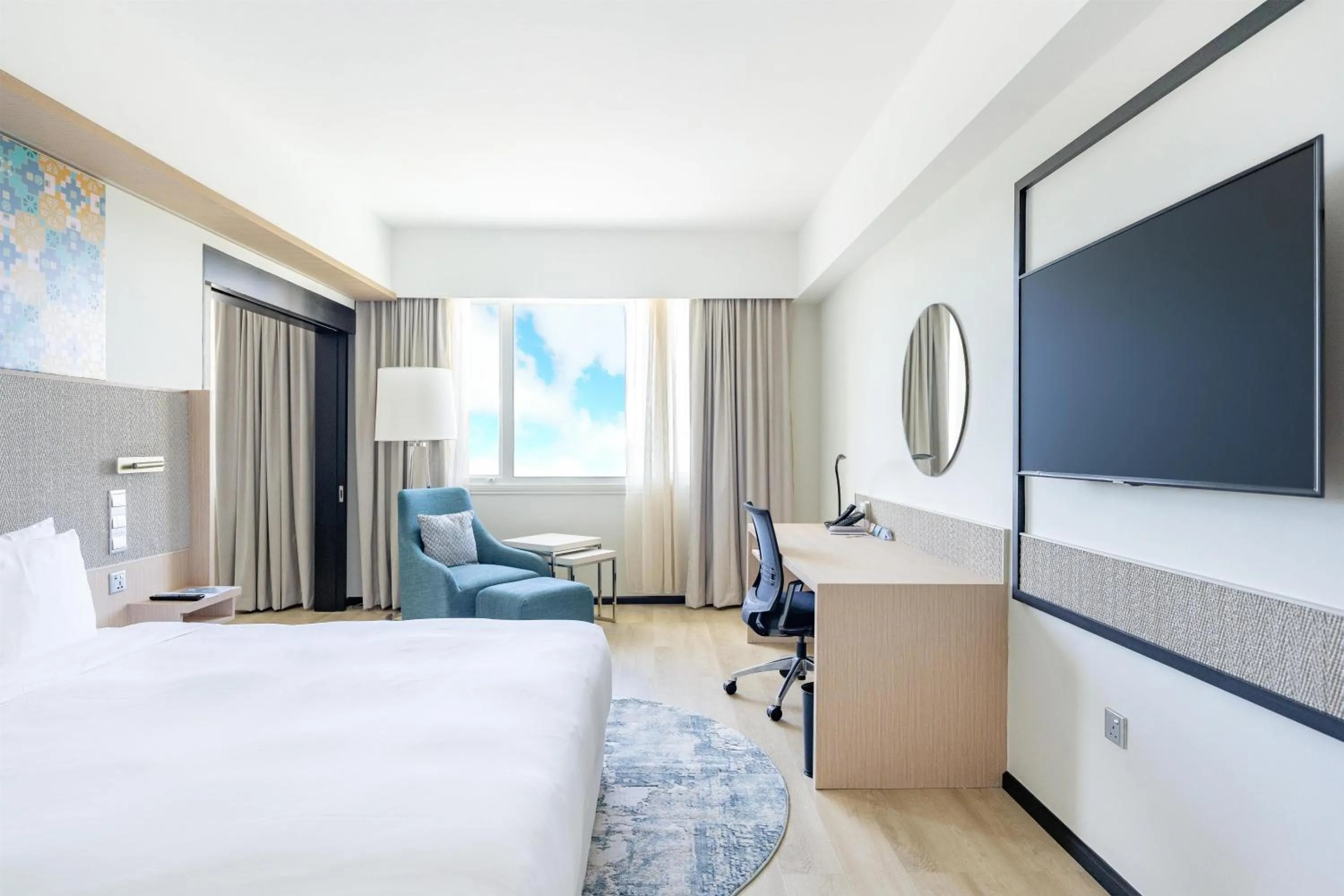 View (from property/room), Bed in Radisson Hotel Brunei Darussalam