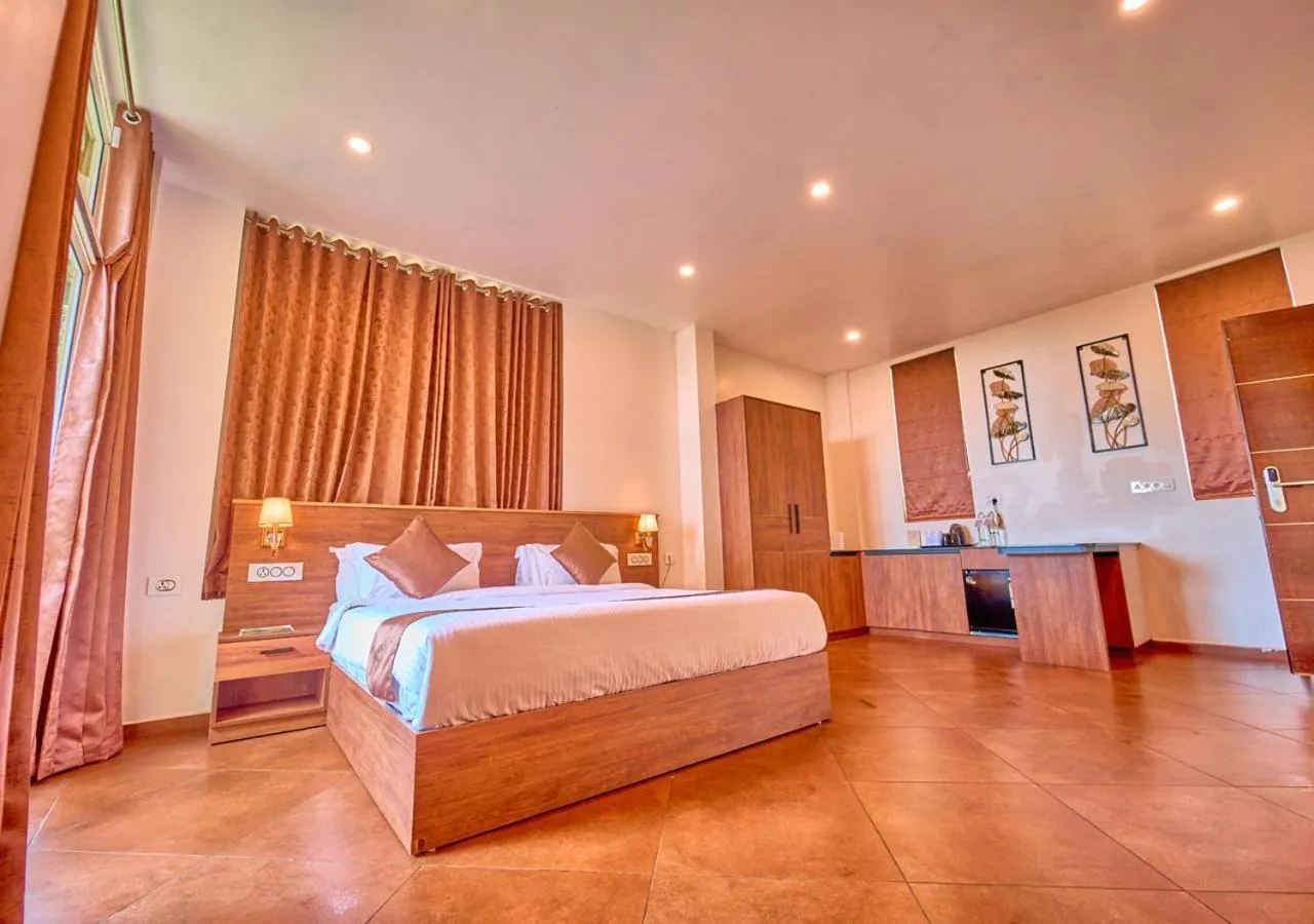 Suite Room in Areva Inn Plantation Resort Munnar with Pool by VOYE HOMES
