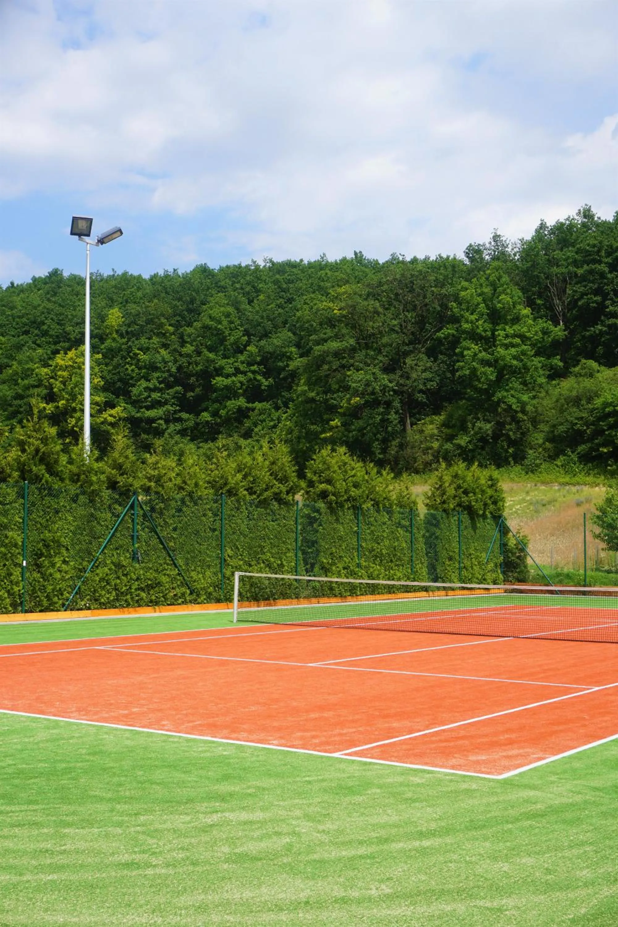 Tennis court in Dosłońce Resort Wellness & Farm