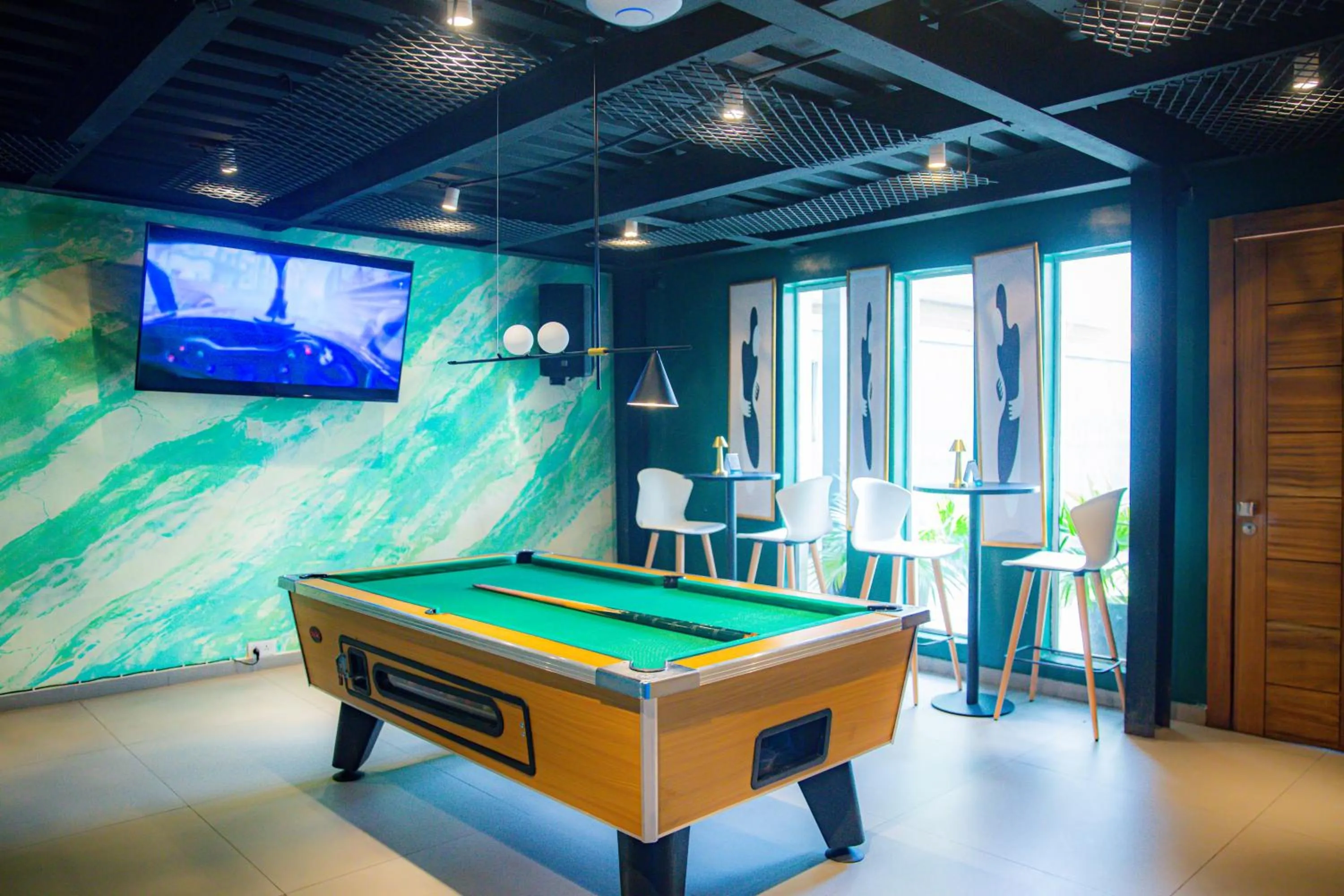 Communal lounge/ TV room in Box Residence Hotel