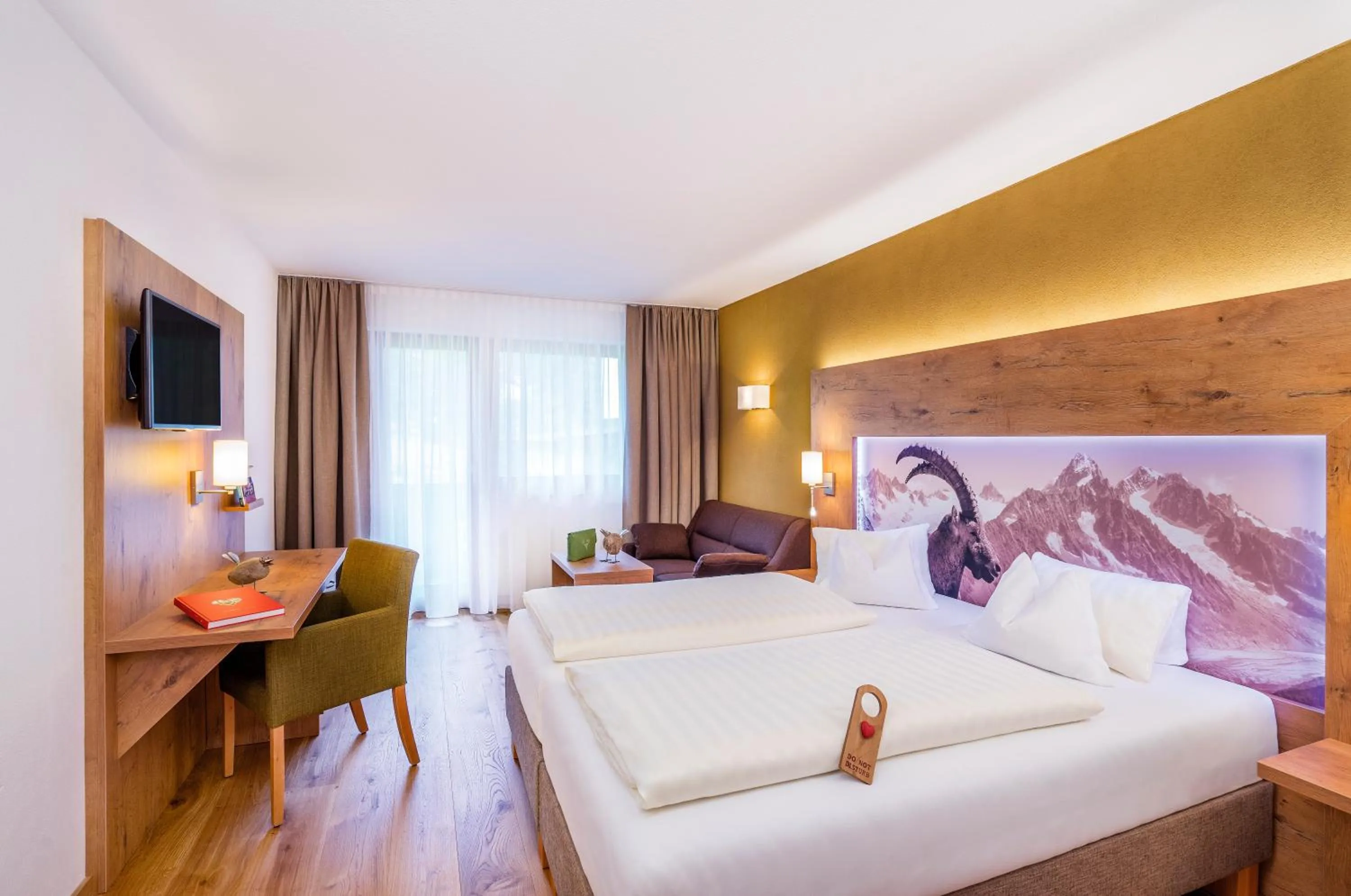 Photo of the whole room, Bed in Biohotel Leutascherhof