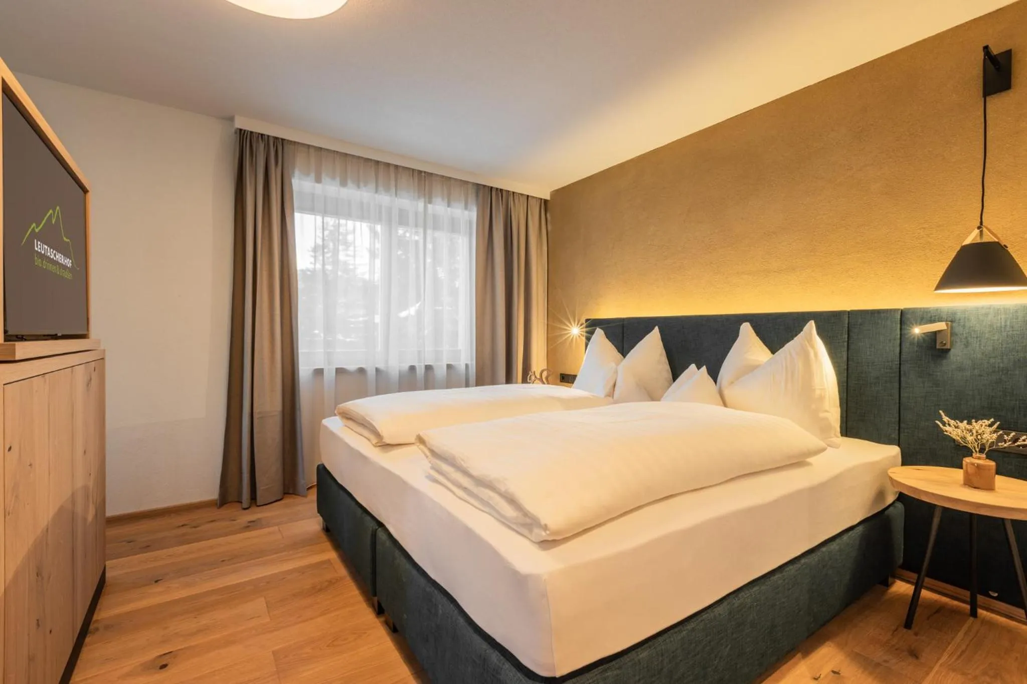 Bed in Biohotel Leutascherhof