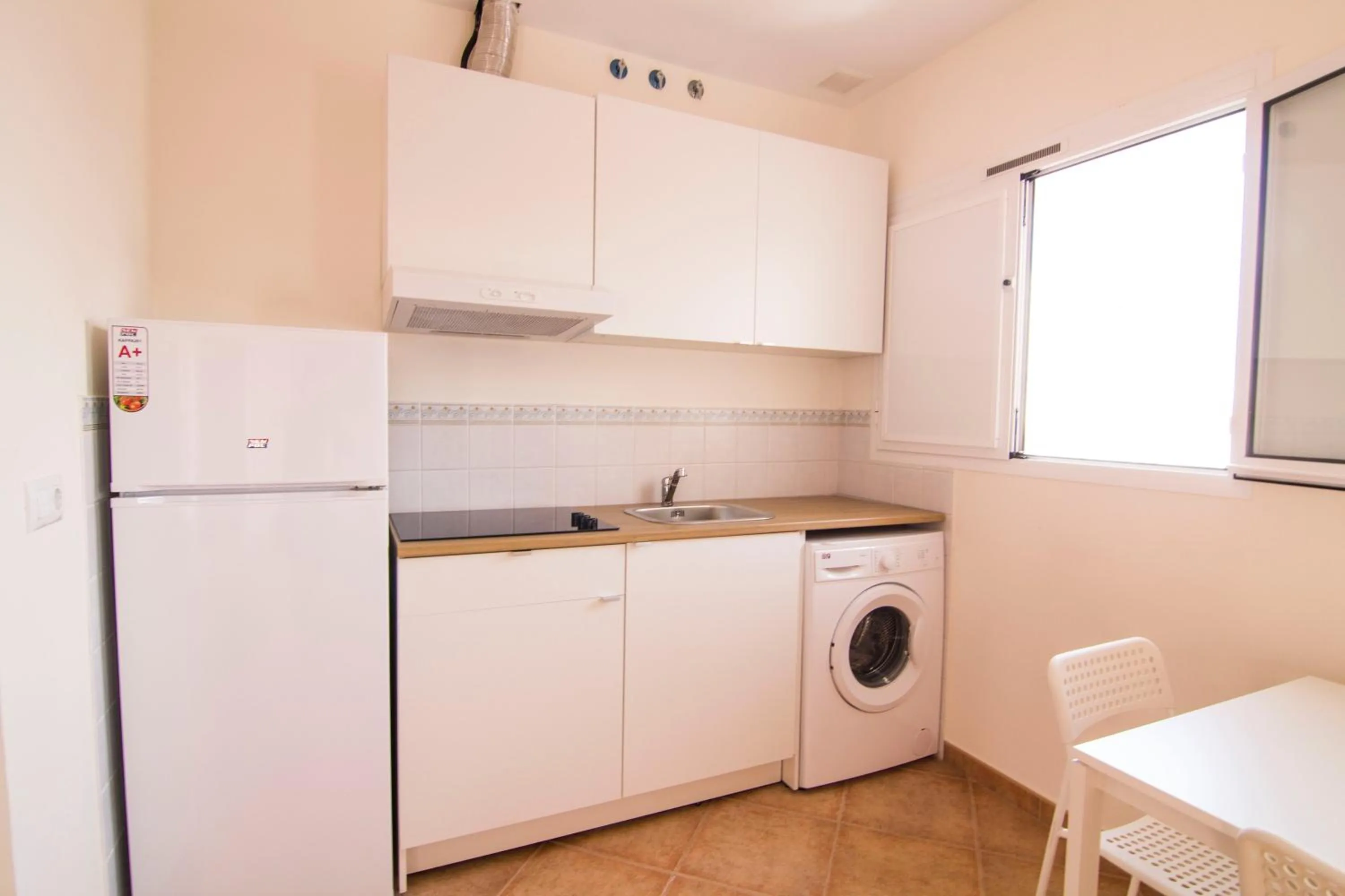 Kitchen or kitchenette in Apartamentos Centro 2 el Puerto